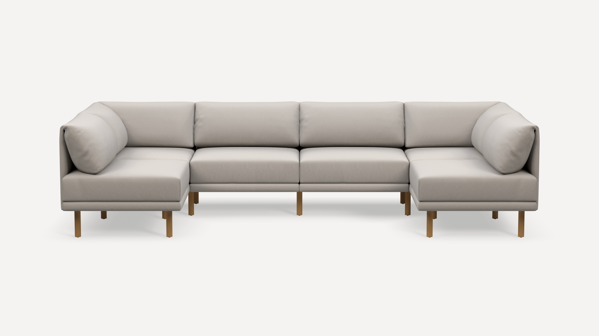 Modern beige fabric sectional sofa with wooden legs, featuring L-shaped design and cushioned backrests on both ends.