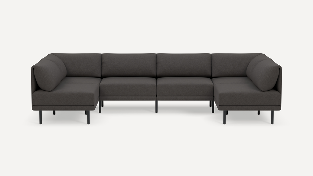 Modern dark gray L-shaped sectional sofa with clean lines, cushioned seats, and slender black metal legs on a white background.