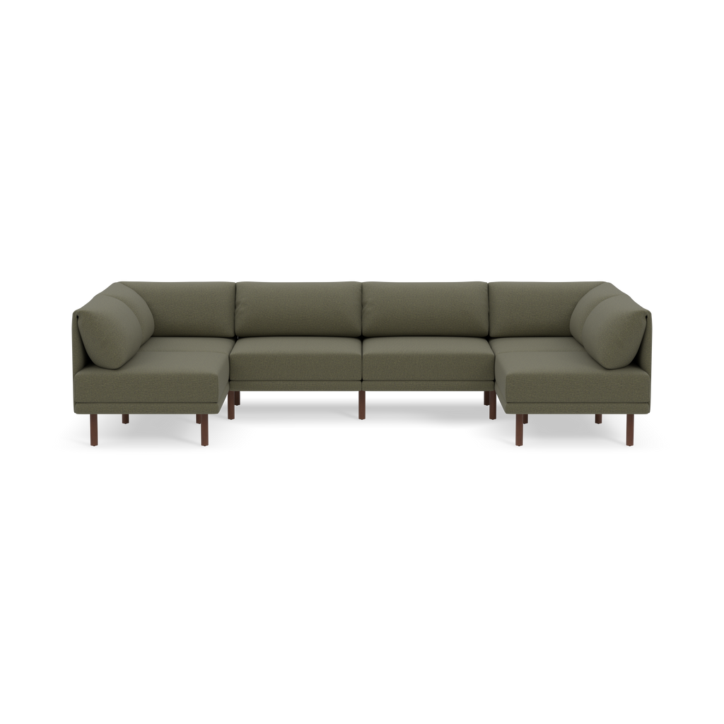 Large Moss green sectional sofa with wooden legs, featuring cushioned seats and backrests, designed for spacious seating.