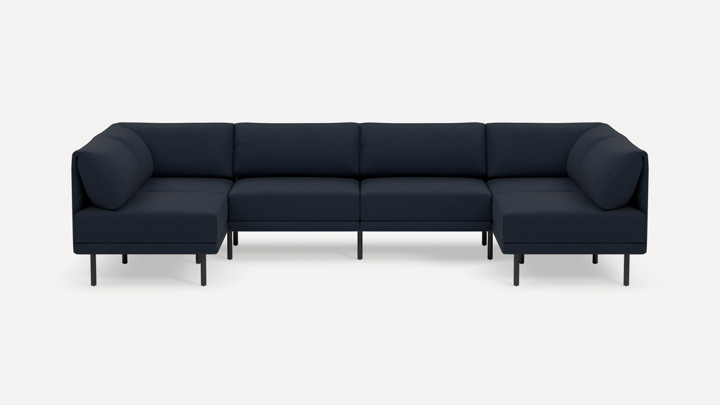 Large modern dark blue sectional sofa with clean lines, cushioned backrests, and black metal legs on a white background.