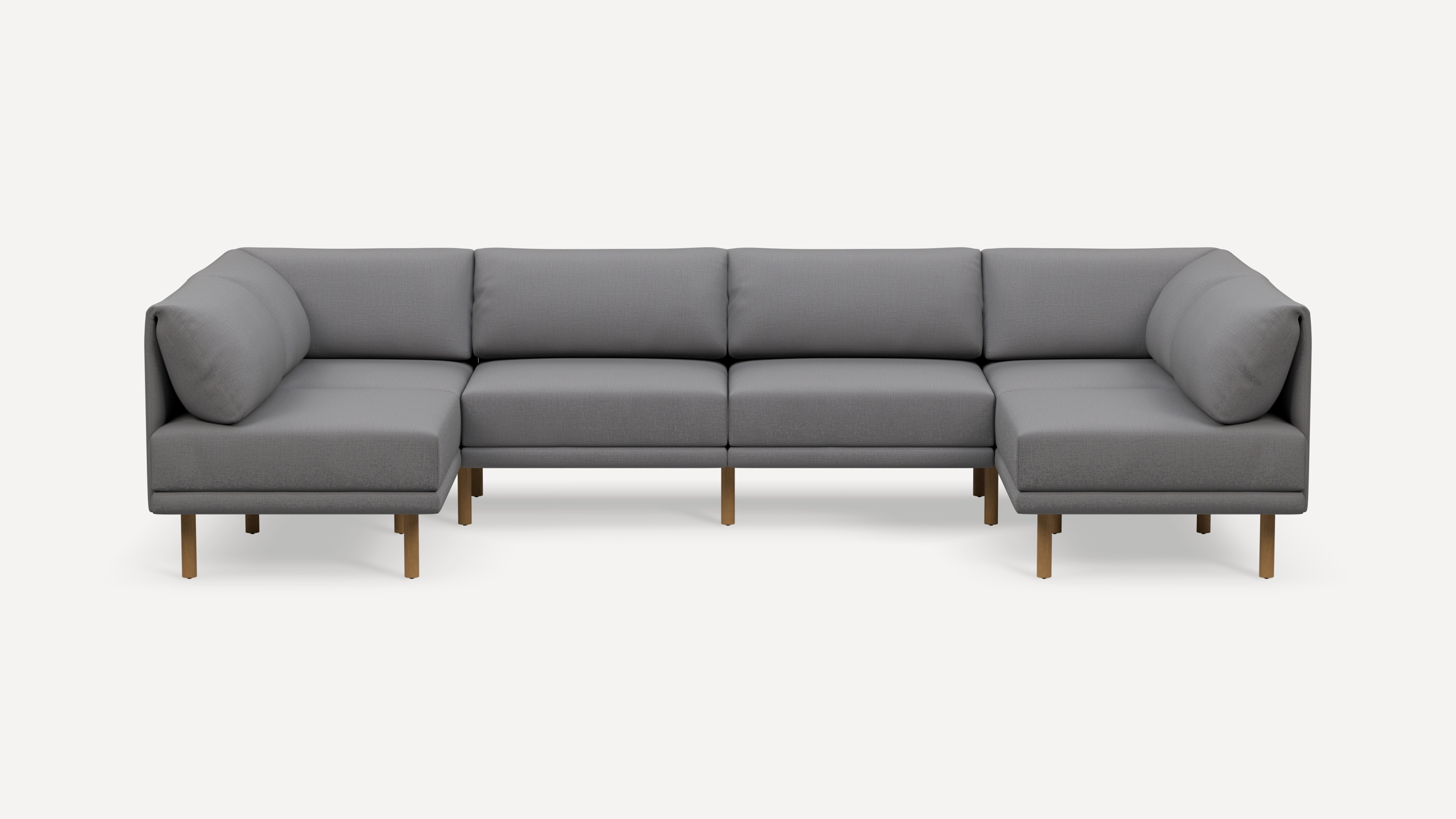 Modern gray fabric U-shaped sectional sofa with wooden legs and padded cushions, set against a plain white background.