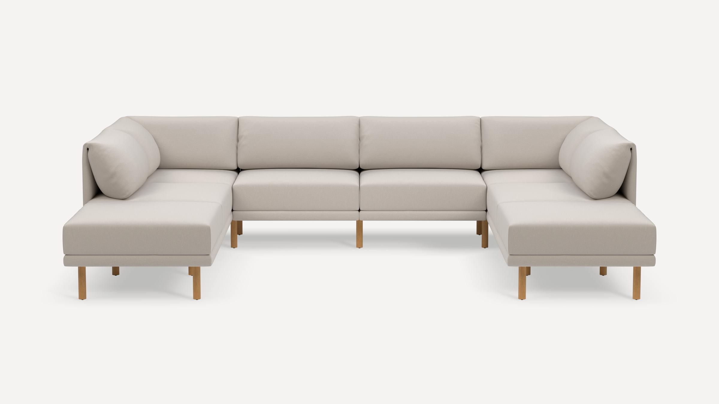 Light beige modern L-shaped sectional sofa with clean lines, cushioned backrests, and wooden legs on a white background.