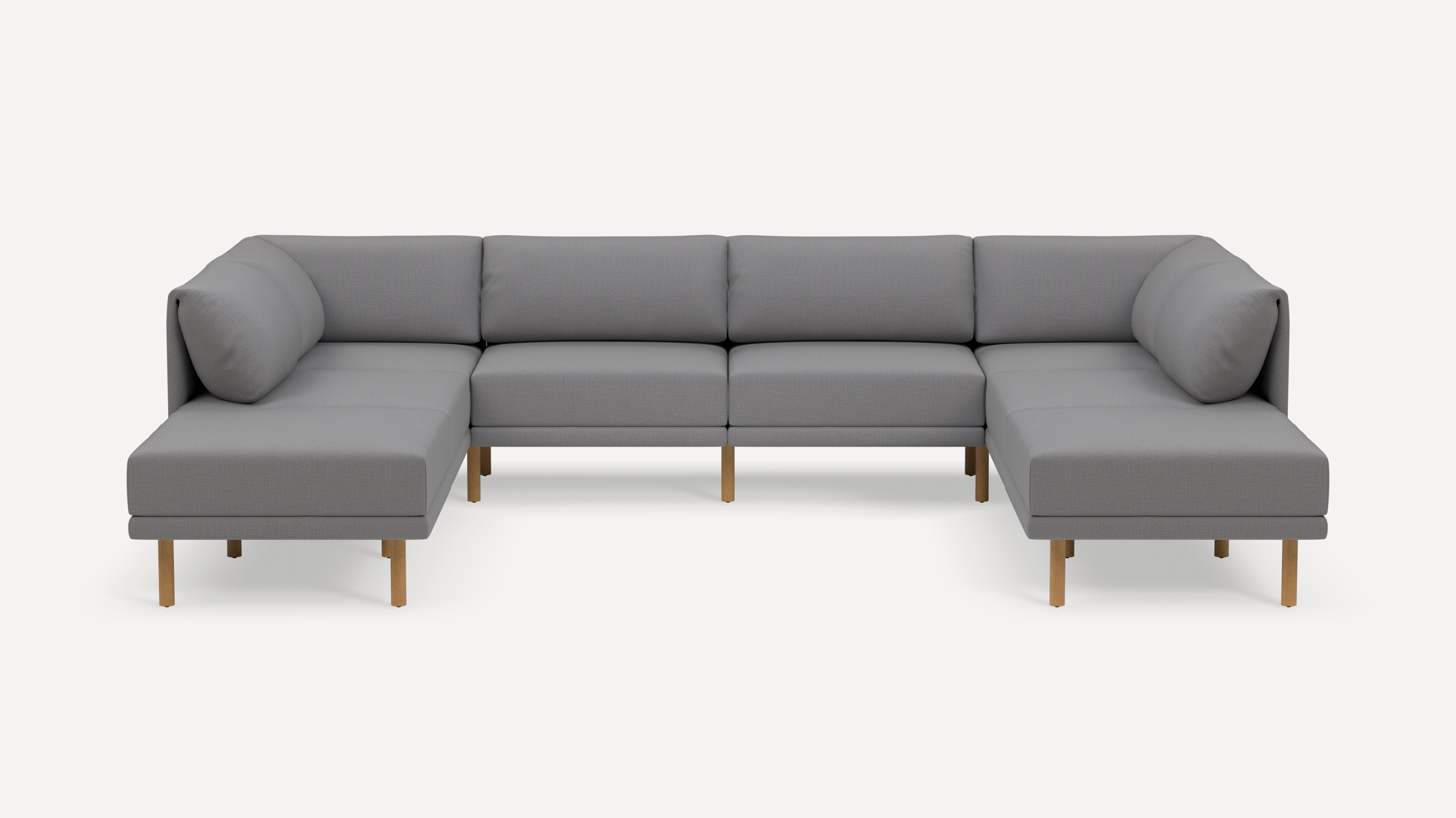 Modern large U-shaped sectional sofa with light gray fabric upholstery and wooden legs, offering ample seating and comfort.