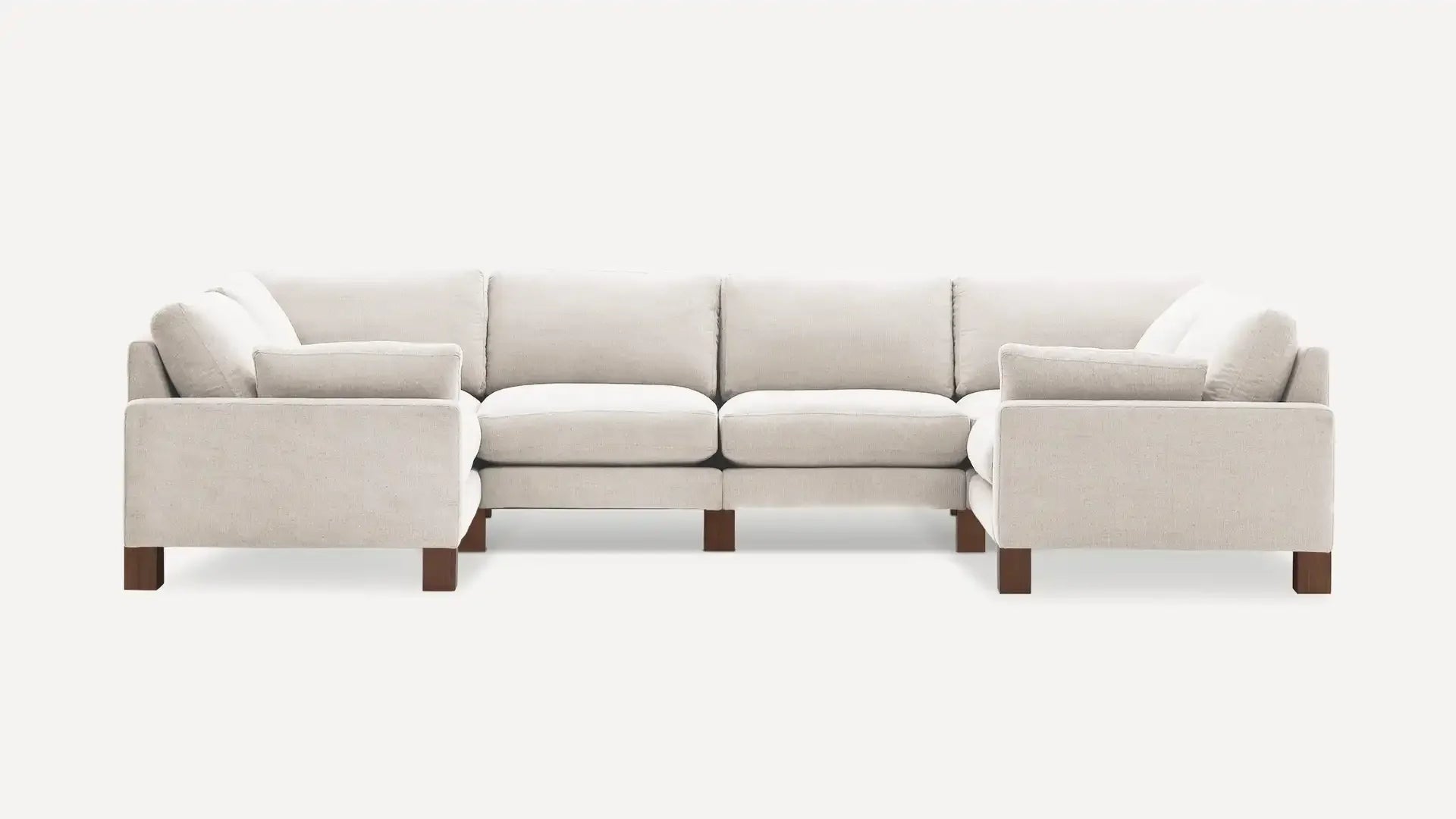 modern l - shaped sectional sofa with beige upholstery and wooden legs, featuring a clean, minimalist design