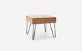 Square wooden side table with light brown top and drawer, supported by four black metal hairpin legs.