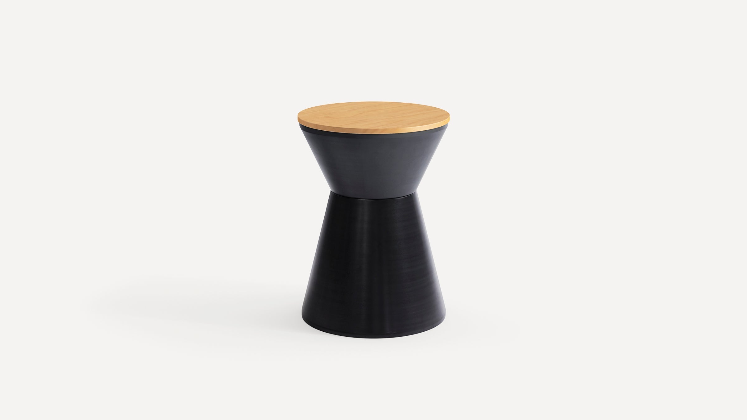 Modern hourglass-shaped black side table with a round light wood top, set against a white background.