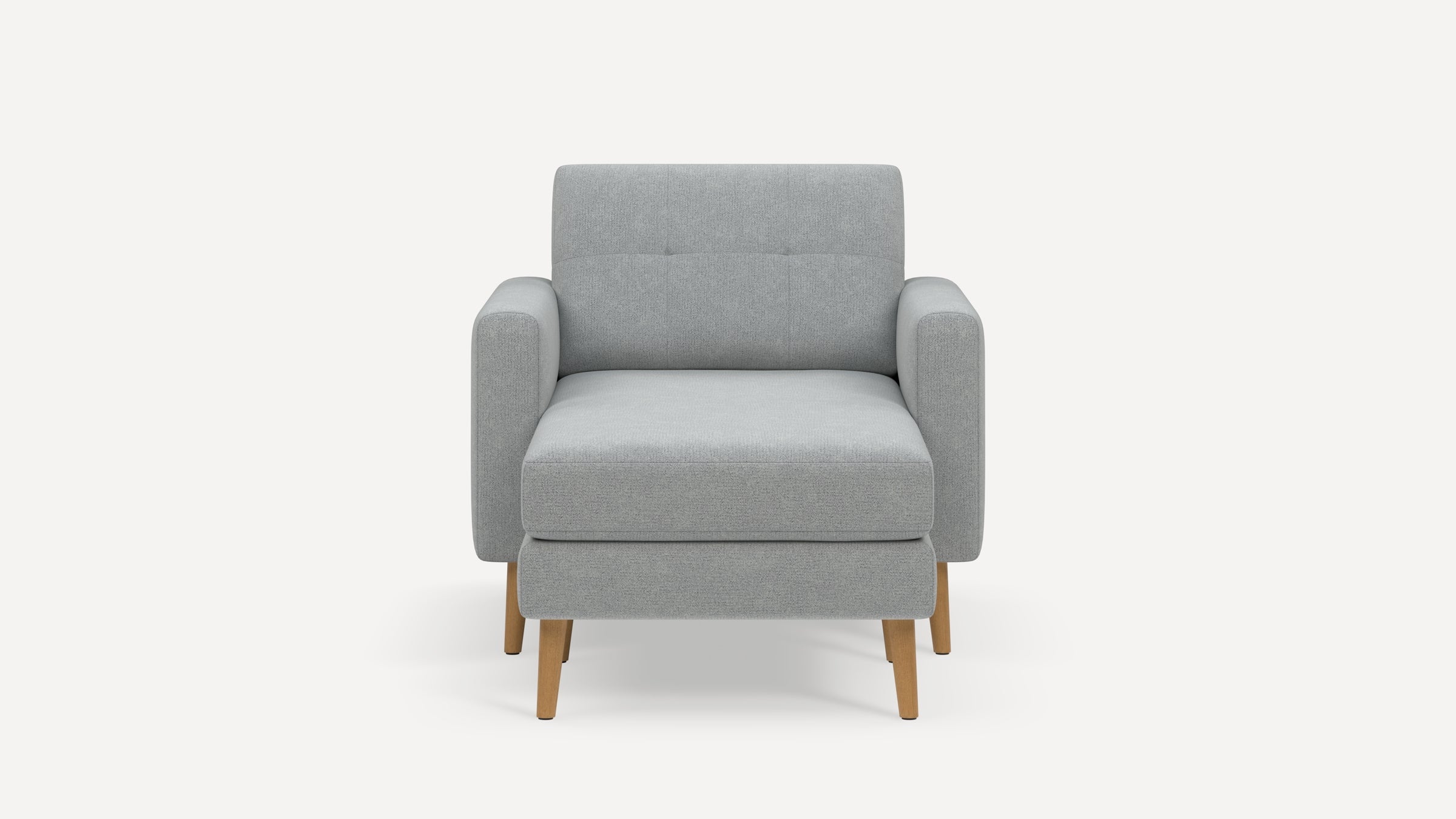 Modern light grey fabric armchair with clean lines, wooden tapered legs, and cushioned seat and backrest.