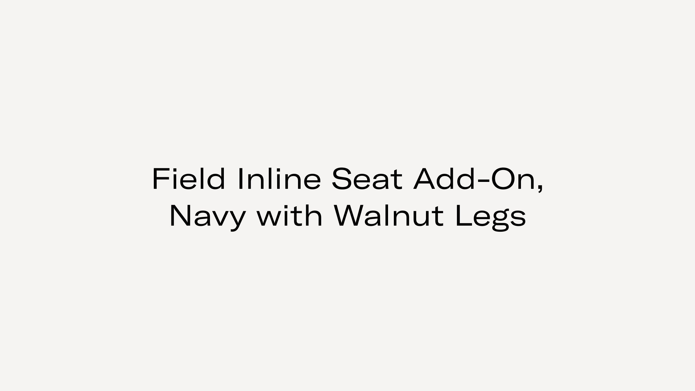 Text reading "Field Inline Seat Add-On, Navy with Walnut Legs" on a plain light gray background.