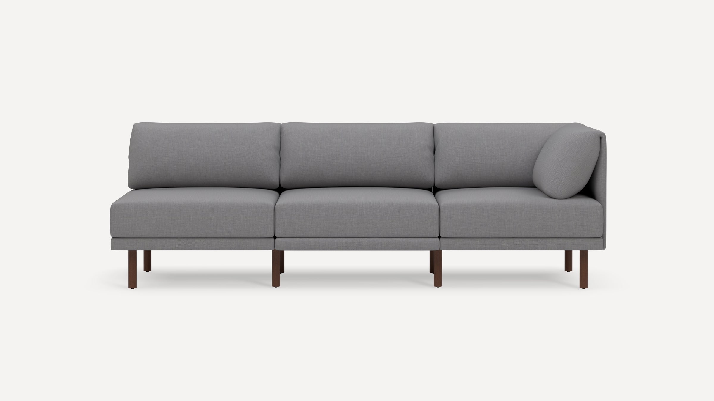 Modern gray fabric sectional sofa with wooden legs, featuring three seating cushions and a simple, clean design.