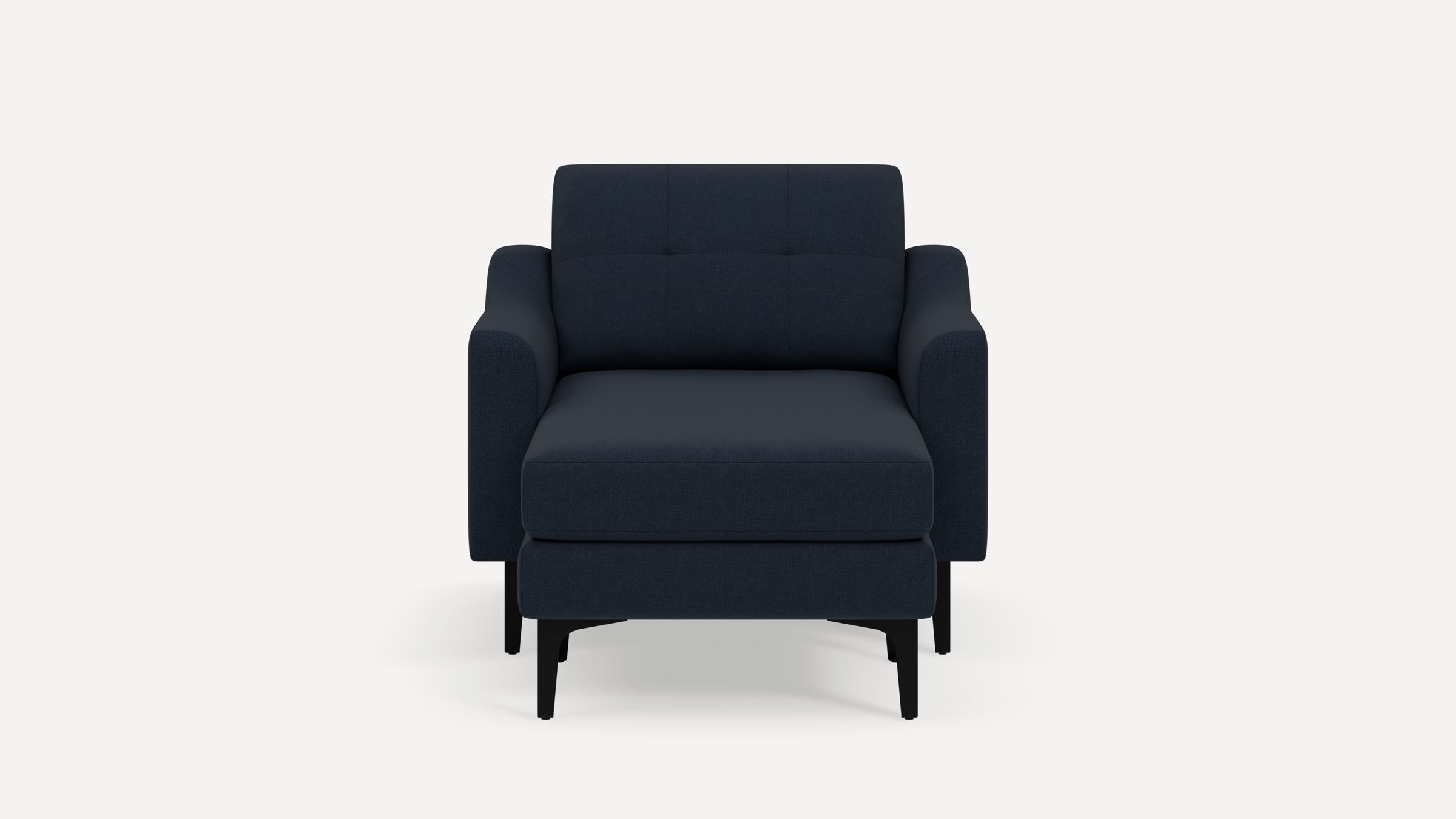 Modern dark navy blue armchair with matching cushioned ottoman, straight armrests, and black wooden legs on white background.