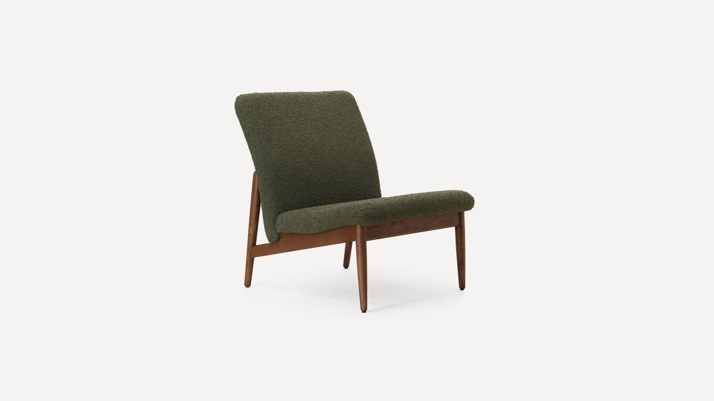modern green upholstered lounge chair with wooden legs and backrest, featuring a wooden tapered seat and backrest, against a white background