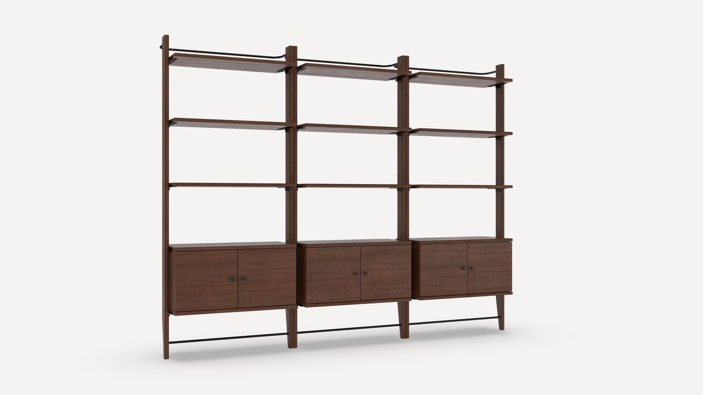 Mid-century modern dark brown wooden bookshelf unit with three cabinets and multiple open shelves, supported by vertical posts.