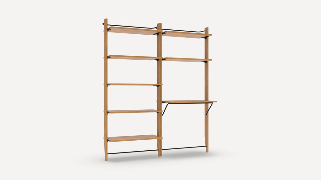 Wooden wall-mounted shelving unit with multiple open shelves and a built-in desk supported by metal brackets.