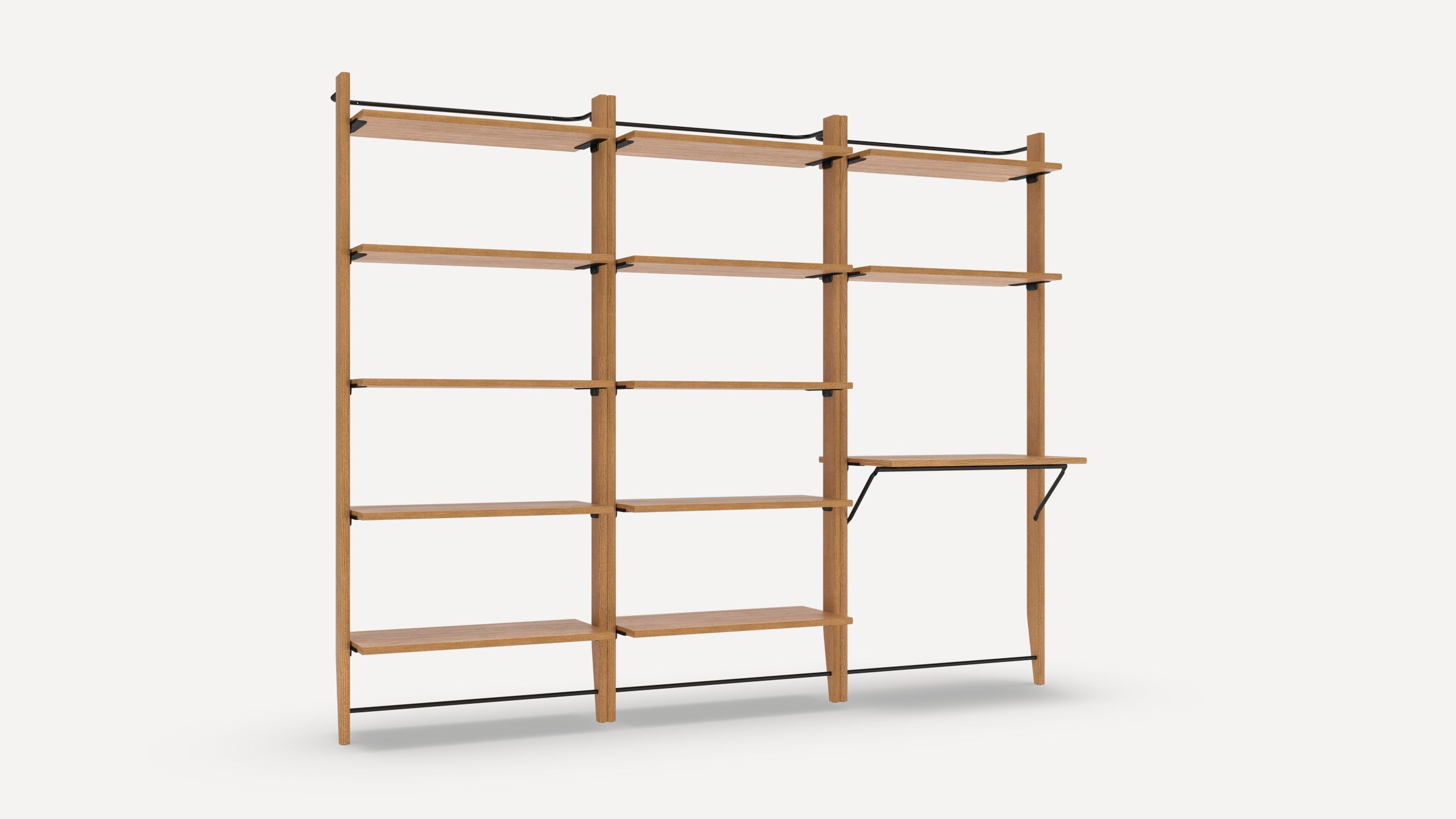 Wooden modular wall-mounted shelving unit with three vertical supports, multiple horizontal shelves, and one fold-down work surface supported by metal brackets.