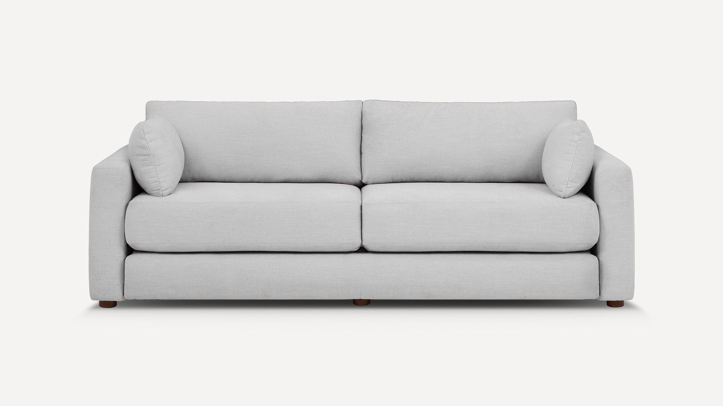 Modern light gray fabric sofa with two large seat cushions, back cushions, and rounded armrests, shown against a plain white background.