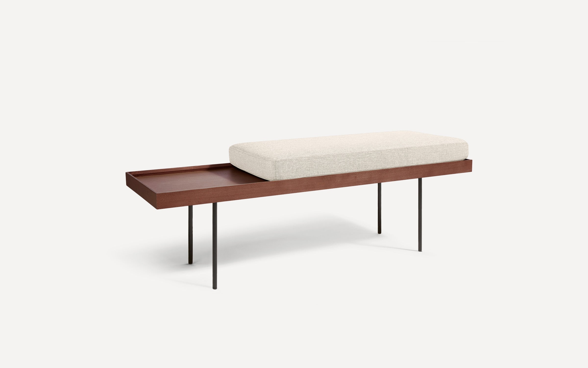 modern wooden bench with a beige upholstered cushion and black metal legs on a white background