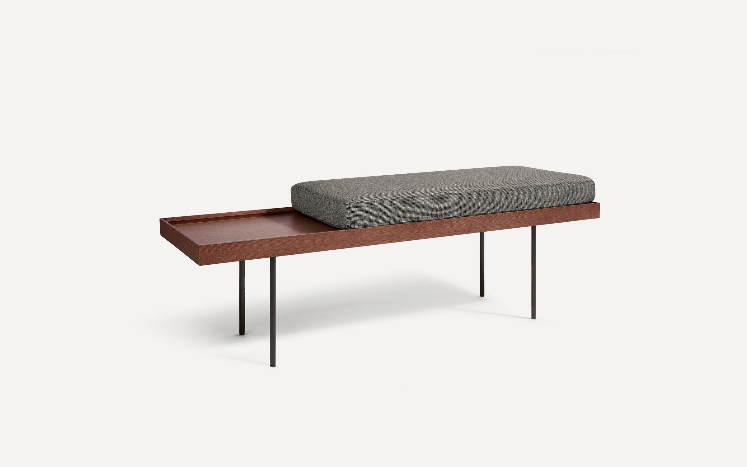 modern wooden bench with gray cushion and black metal legs on white background