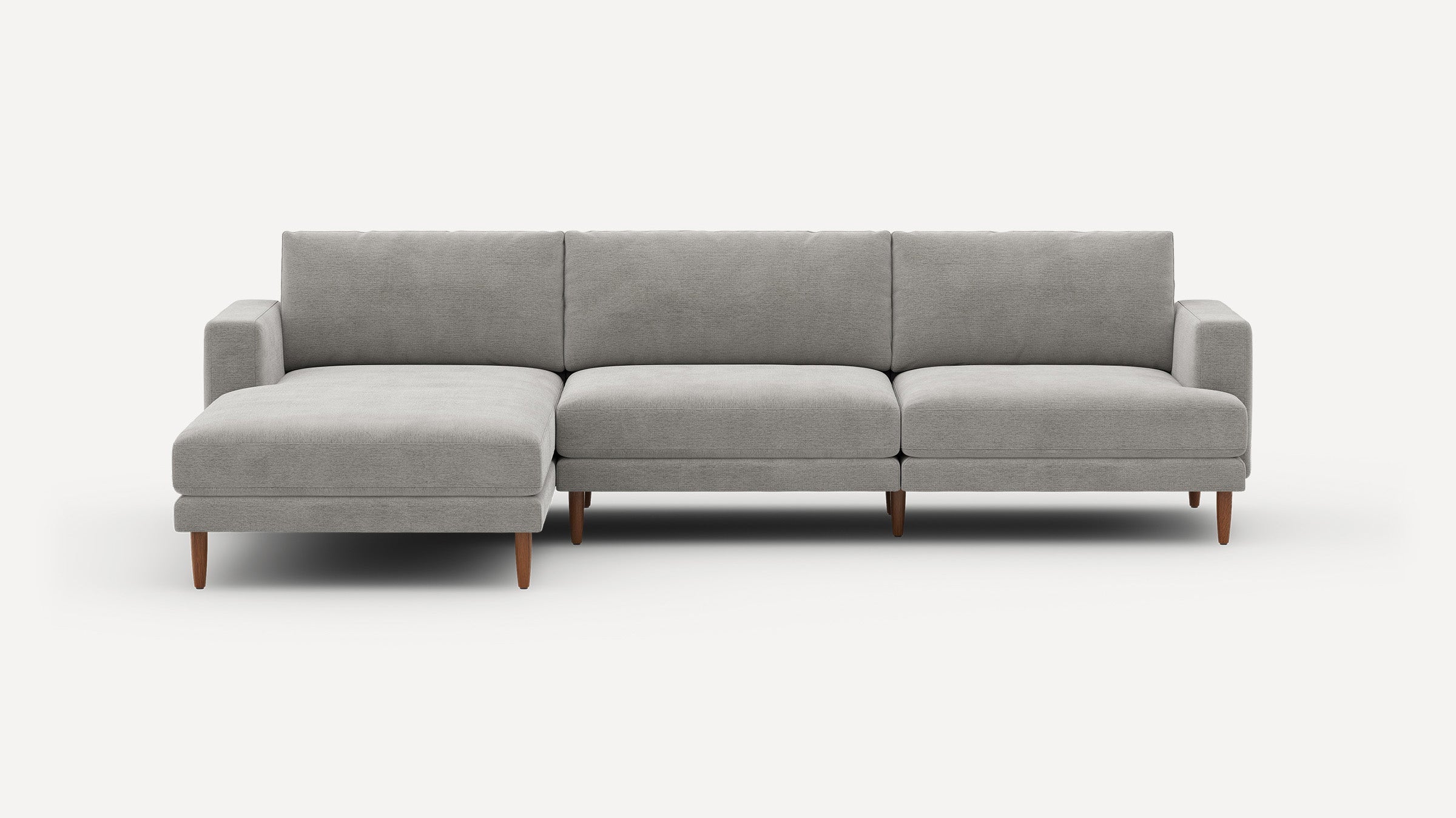 Modern gray fabric sectional sofa with left chaise, wooden legs, and clean straight lines, set against a plain white background.