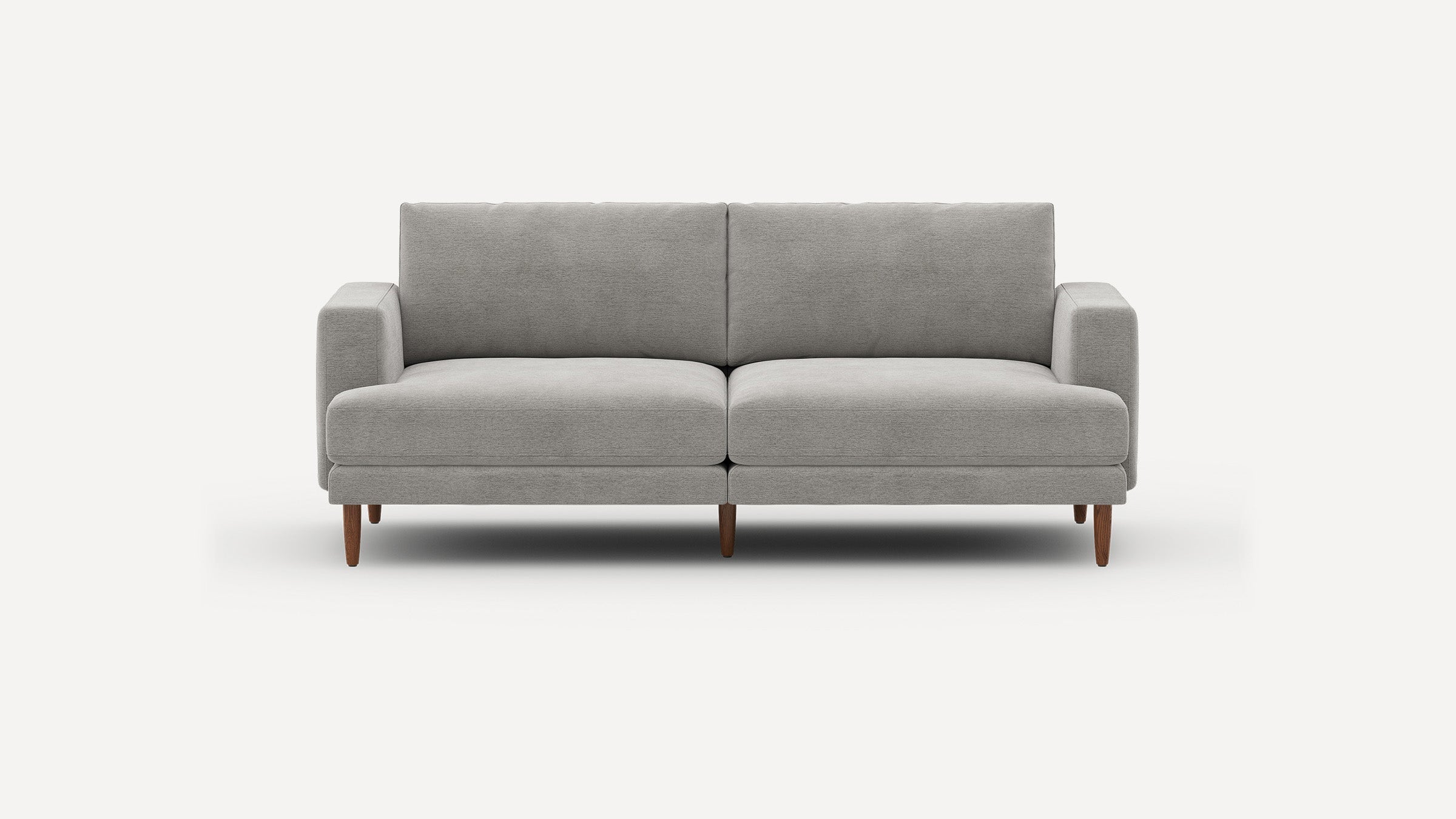 Modern light gray fabric sofa with clean lines, wooden tapered legs, and boxy armrests, shown from the front.