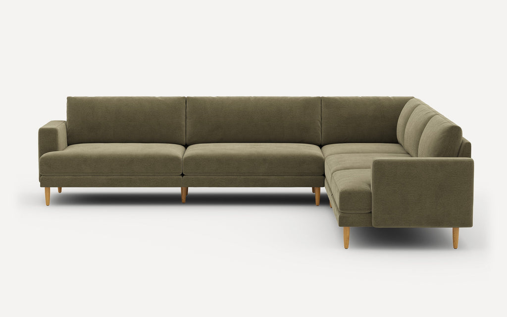 Modern olive green L-shaped sectional sofa with wooden legs and clean, minimalist design on white background.