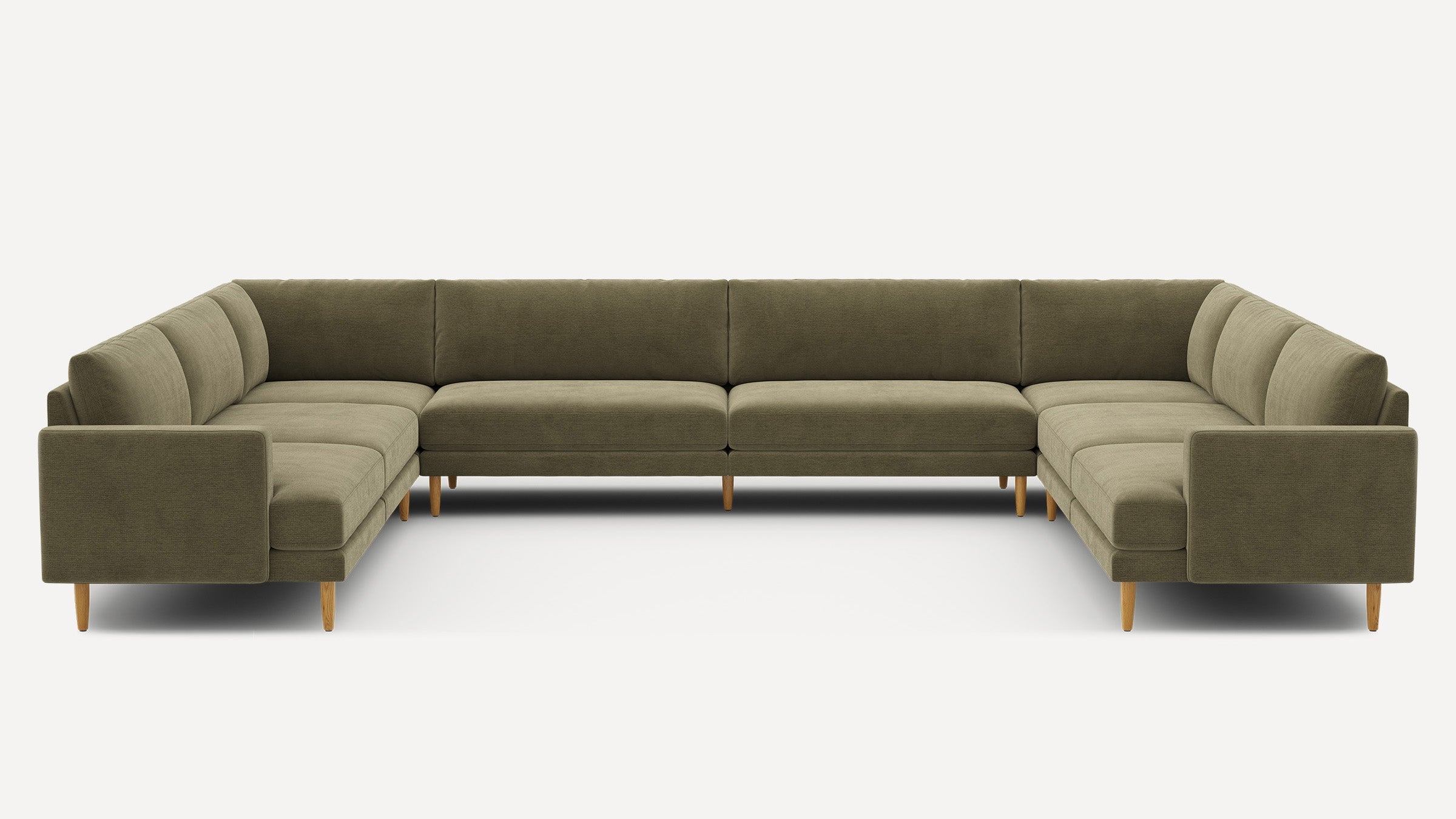 Large U-shaped sectional sofa with olive green fabric upholstery and wooden tapered legs, featuring clean lines and modern design.