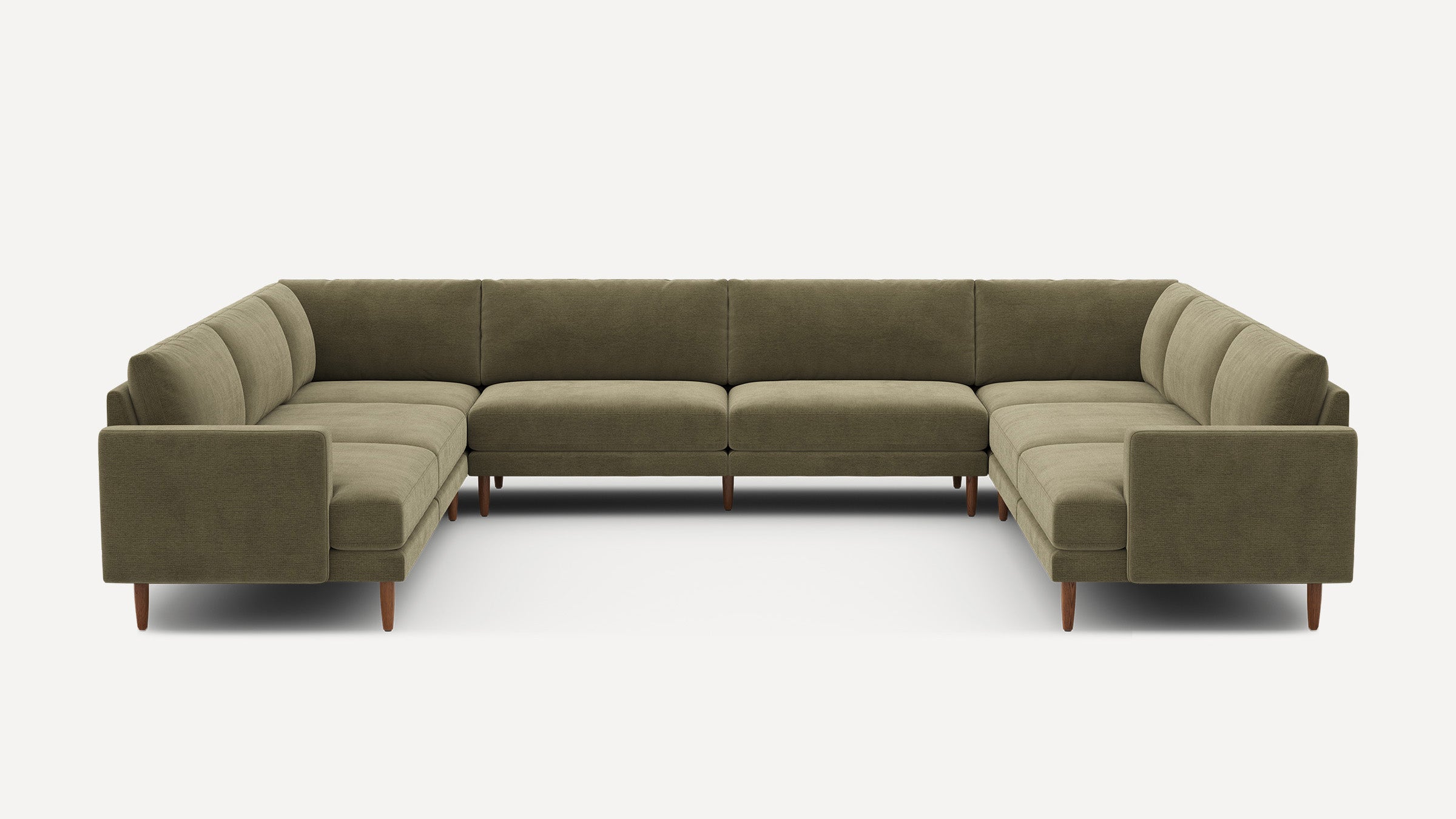 Large U-shaped sectional sofa with olive green fabric upholstery and wooden legs, featuring clean modern design and padded cushions.