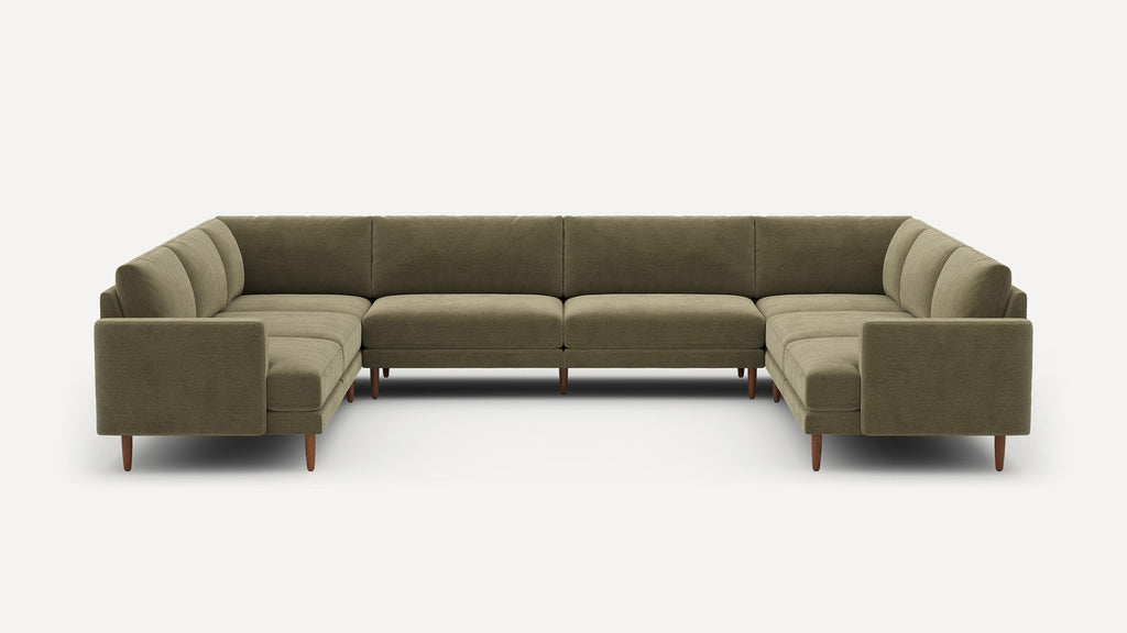 Large U-shaped sectional sofa with olive green fabric upholstery and wooden tapered legs, featuring clean modern lines and cushioned seats.