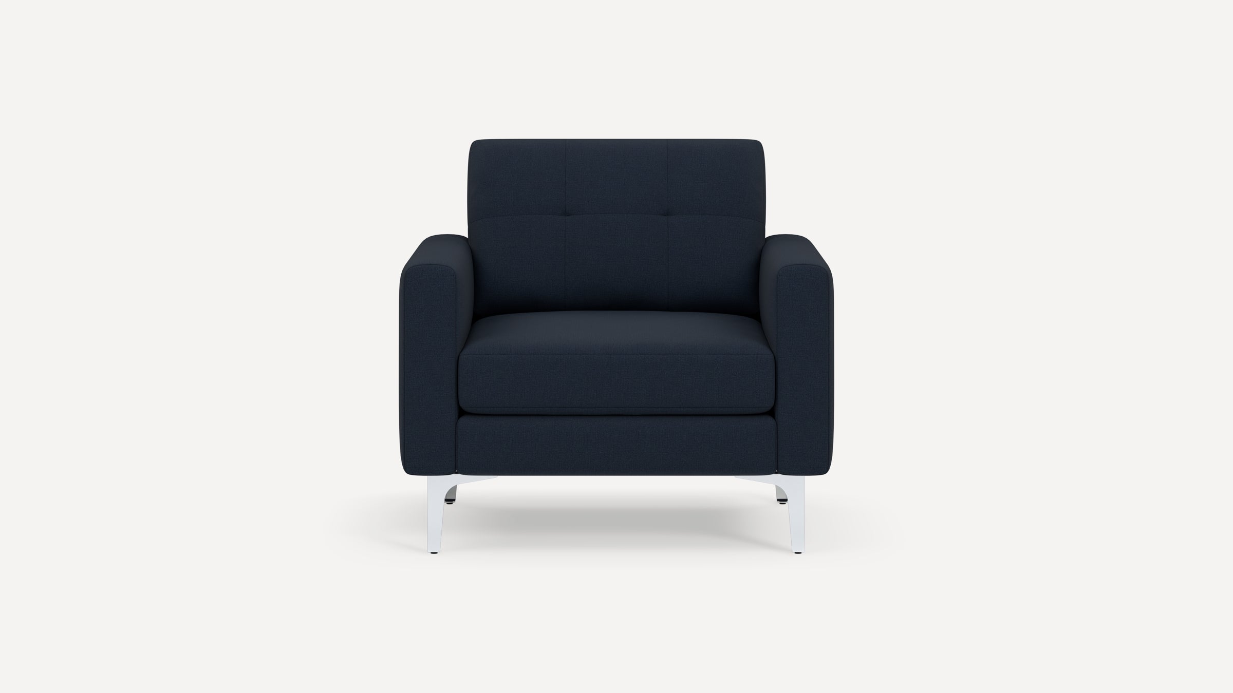 Front view of a modern navy blue armchair with cushioned seat, tufted backrest, and sleek metal legs.