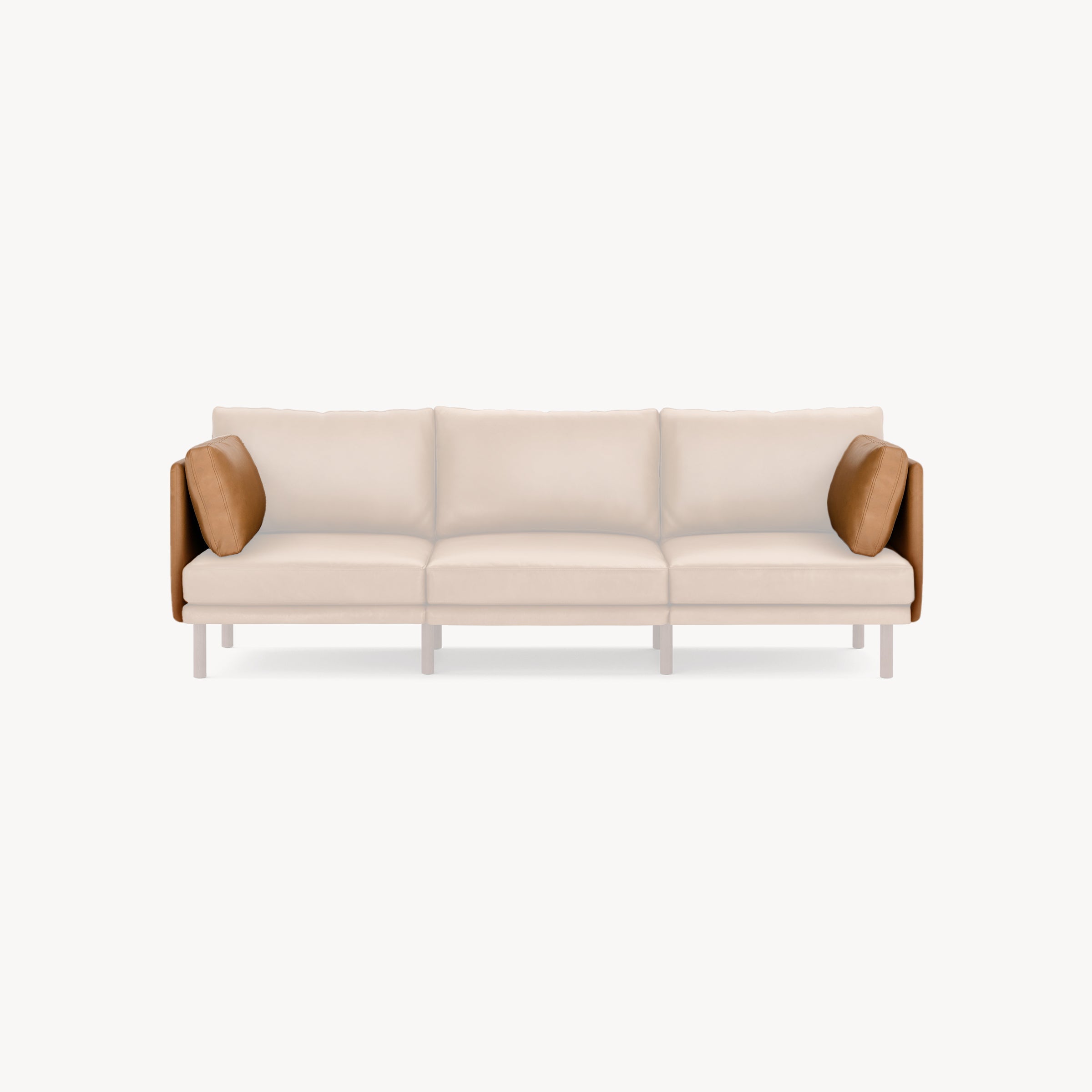 Modern three-seater sofa with light beige cushions, wooden frame, and contrasting brown leather side pillows.