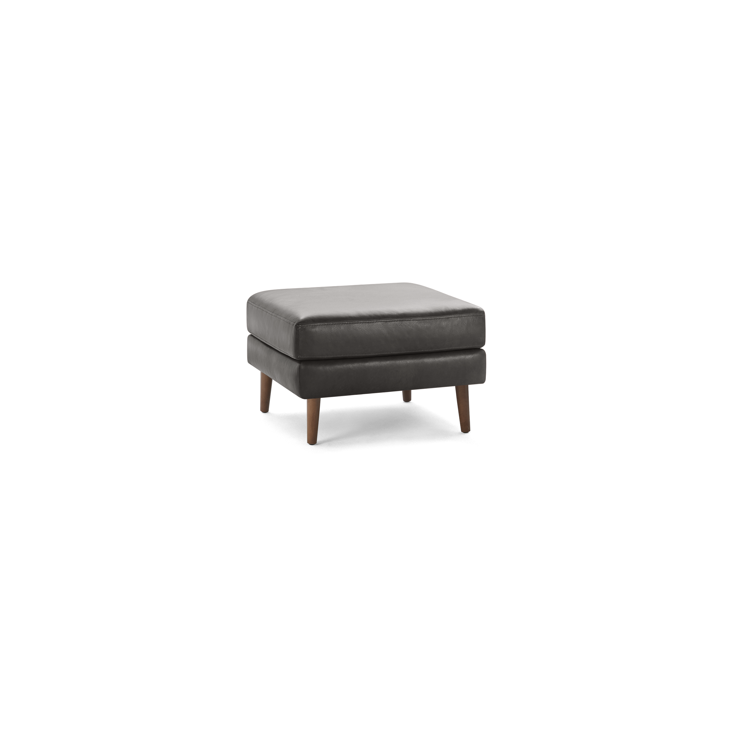 Square dark gray leather ottoman with tufted cushion top and four tapered wooden legs.