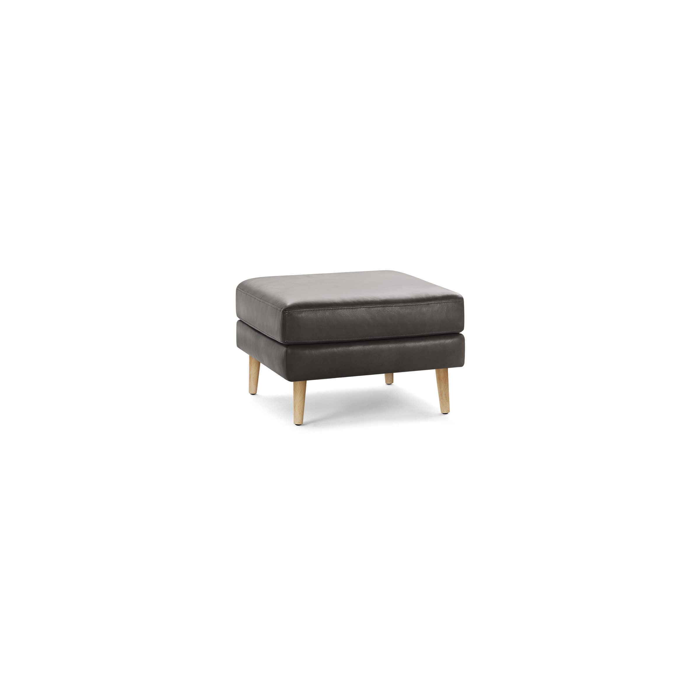 Square ottoman upholstered in dark grey leather with light wooden tapered legs, featuring a cushioned top and minimalistic design.