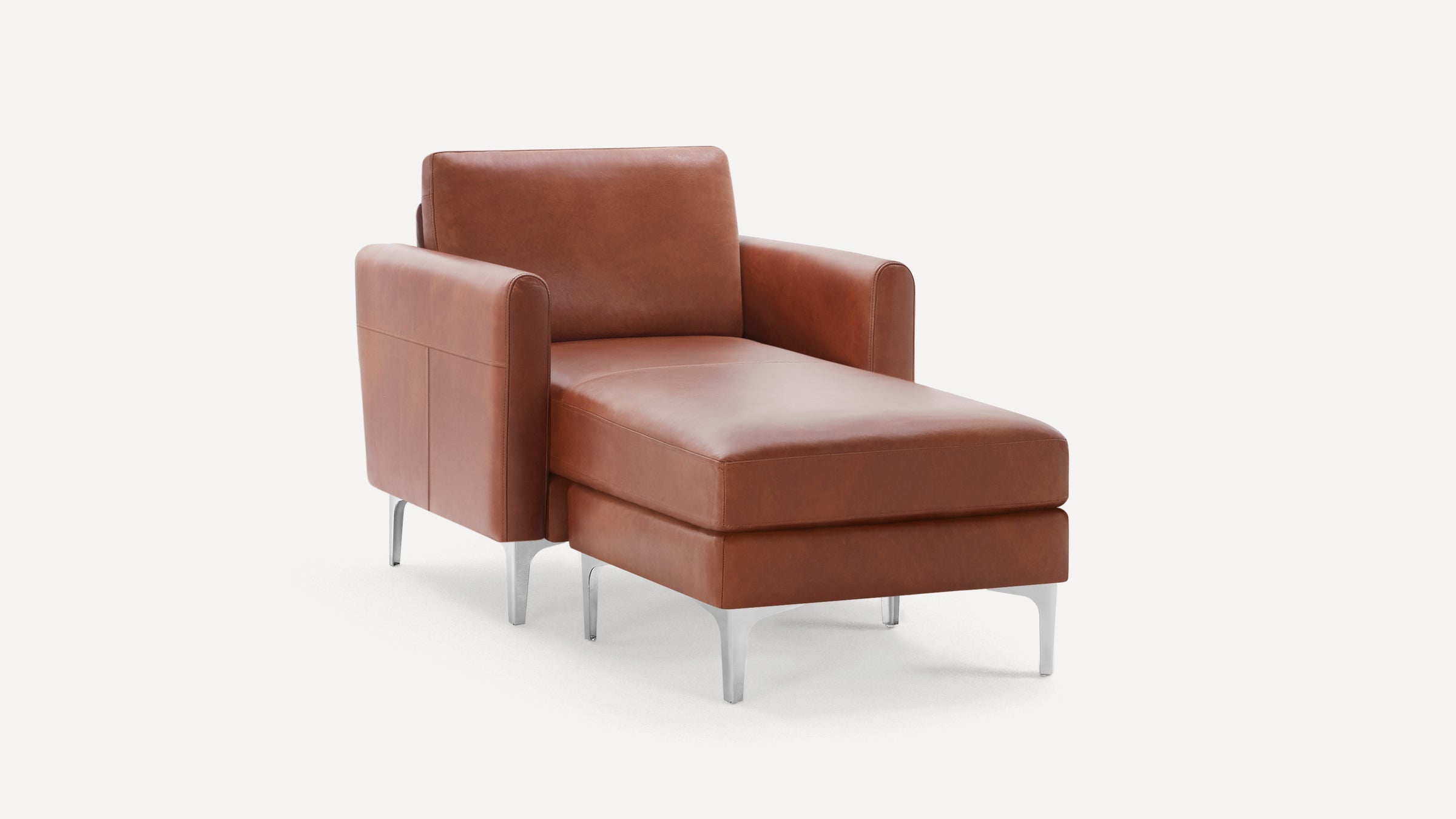 Modern brown leather chaise lounge with metal legs and cushioned armrests, angled against a plain white background.