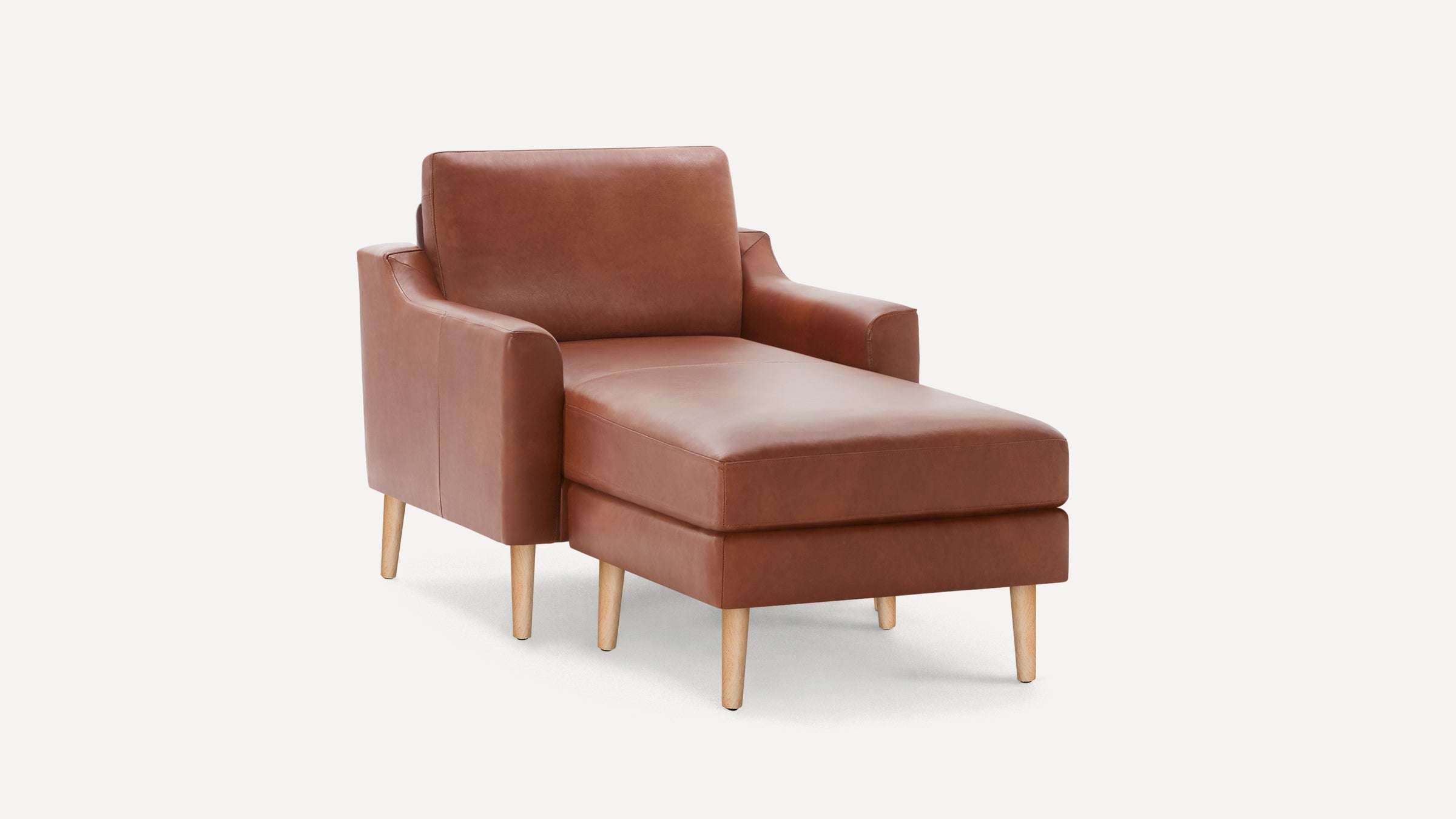 Mid-century modern brown leather chaise lounge chair with wooden legs, featuring a cushioned seat and backrest.