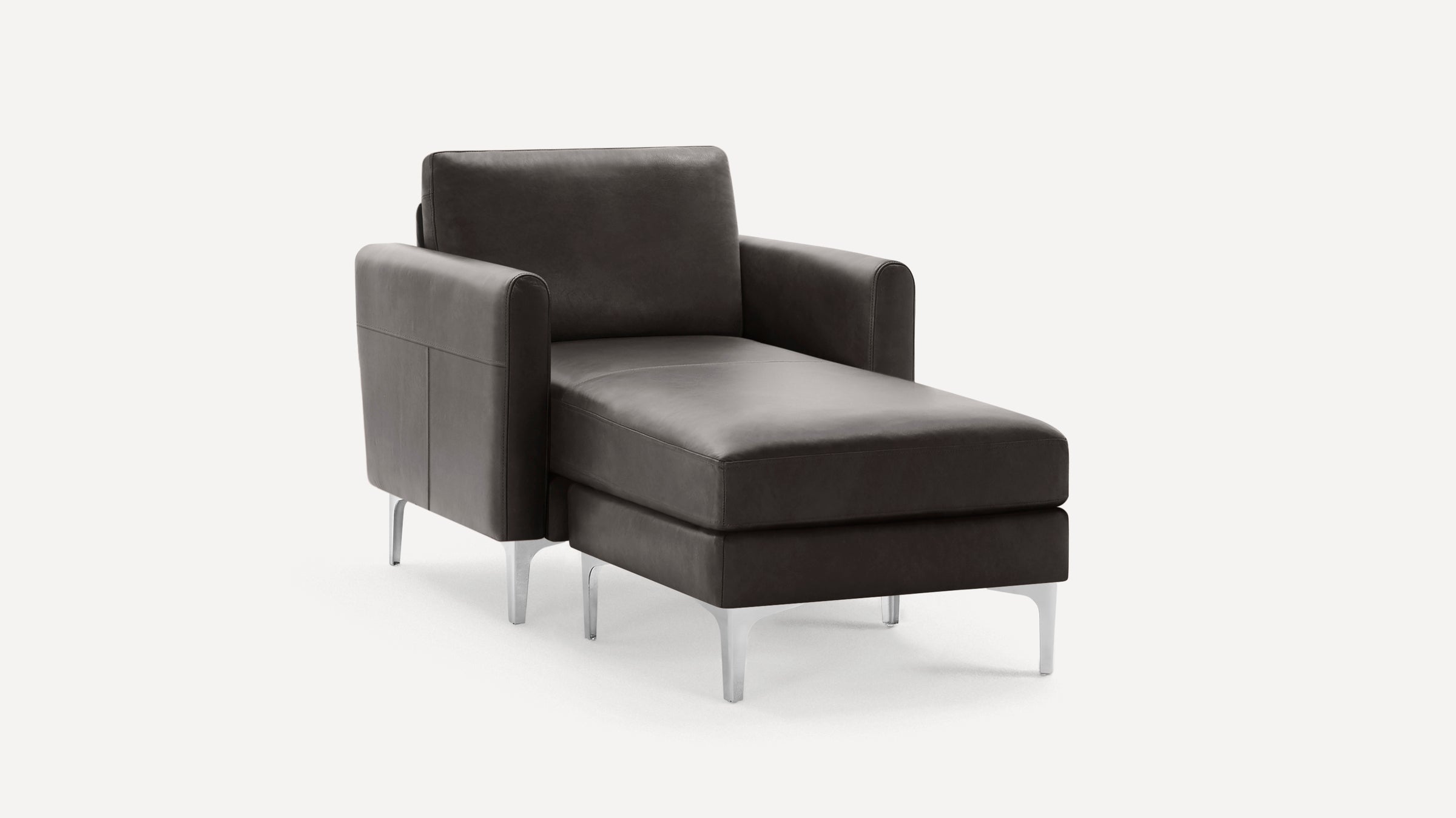 Modern dark gray leather chaise lounge with square armrests and sleek metal legs on a white background.