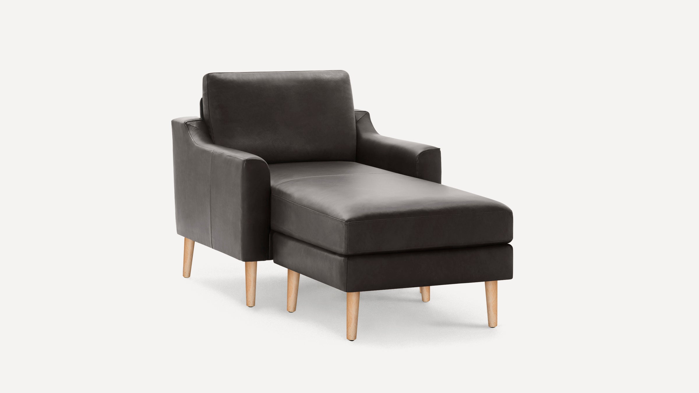 Modern dark gray chaise lounge with leather upholstery, straight armrests, cushioned seat, and light wooden legs on white background.