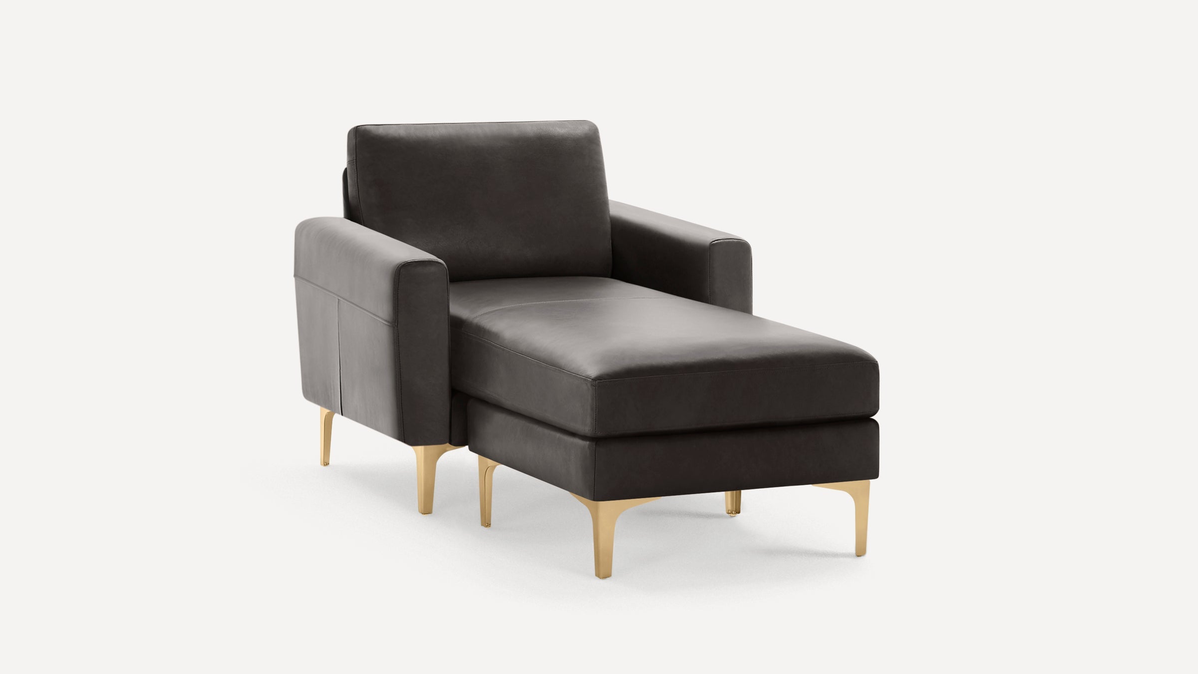 Dark gray leather chaise lounge with armrests, cushioned seat, and gold metal legs on a white background.