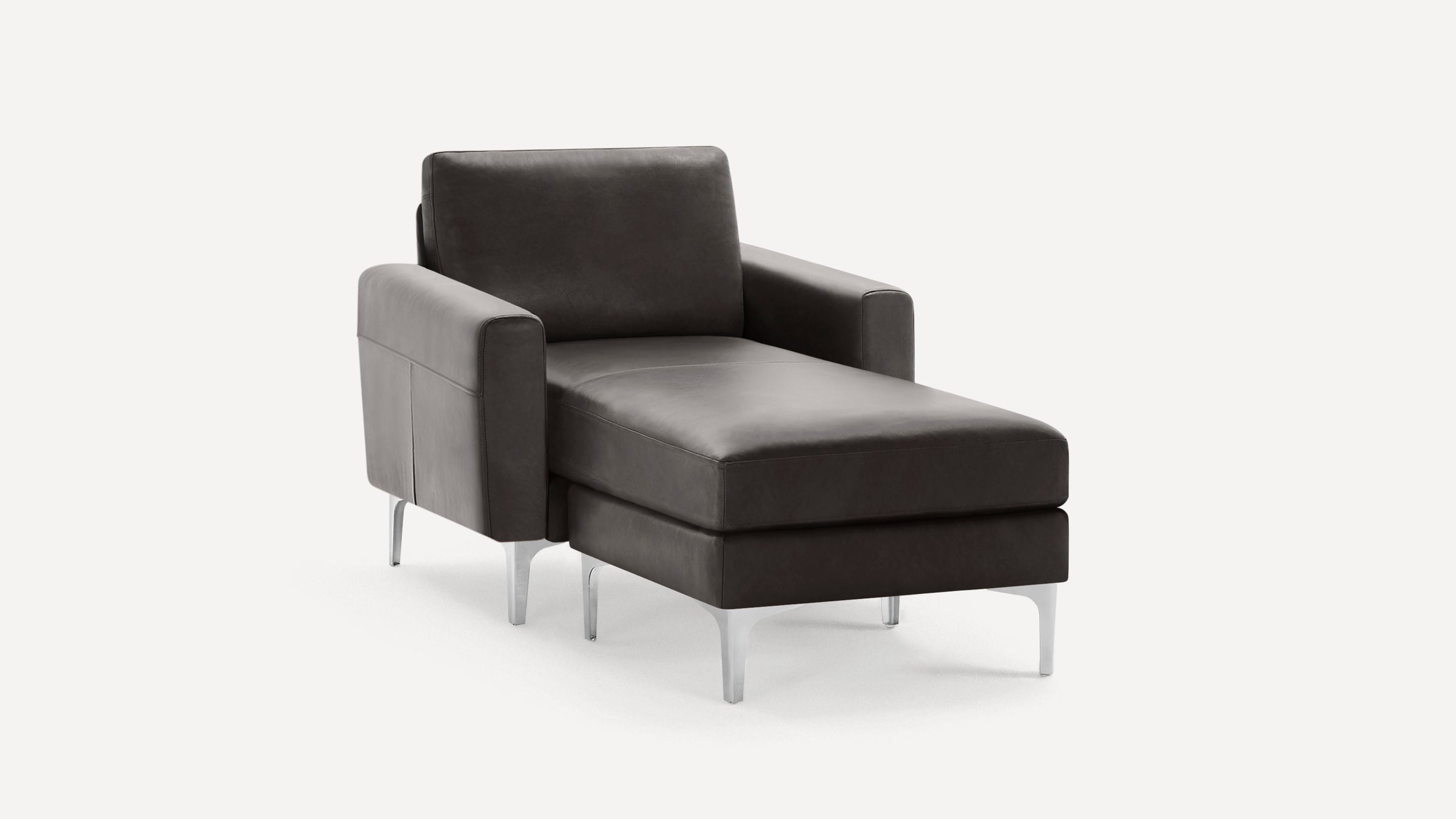 Modern dark gray leather chaise lounge with armrests, cushioned seat, and sleek metal legs on a white background.