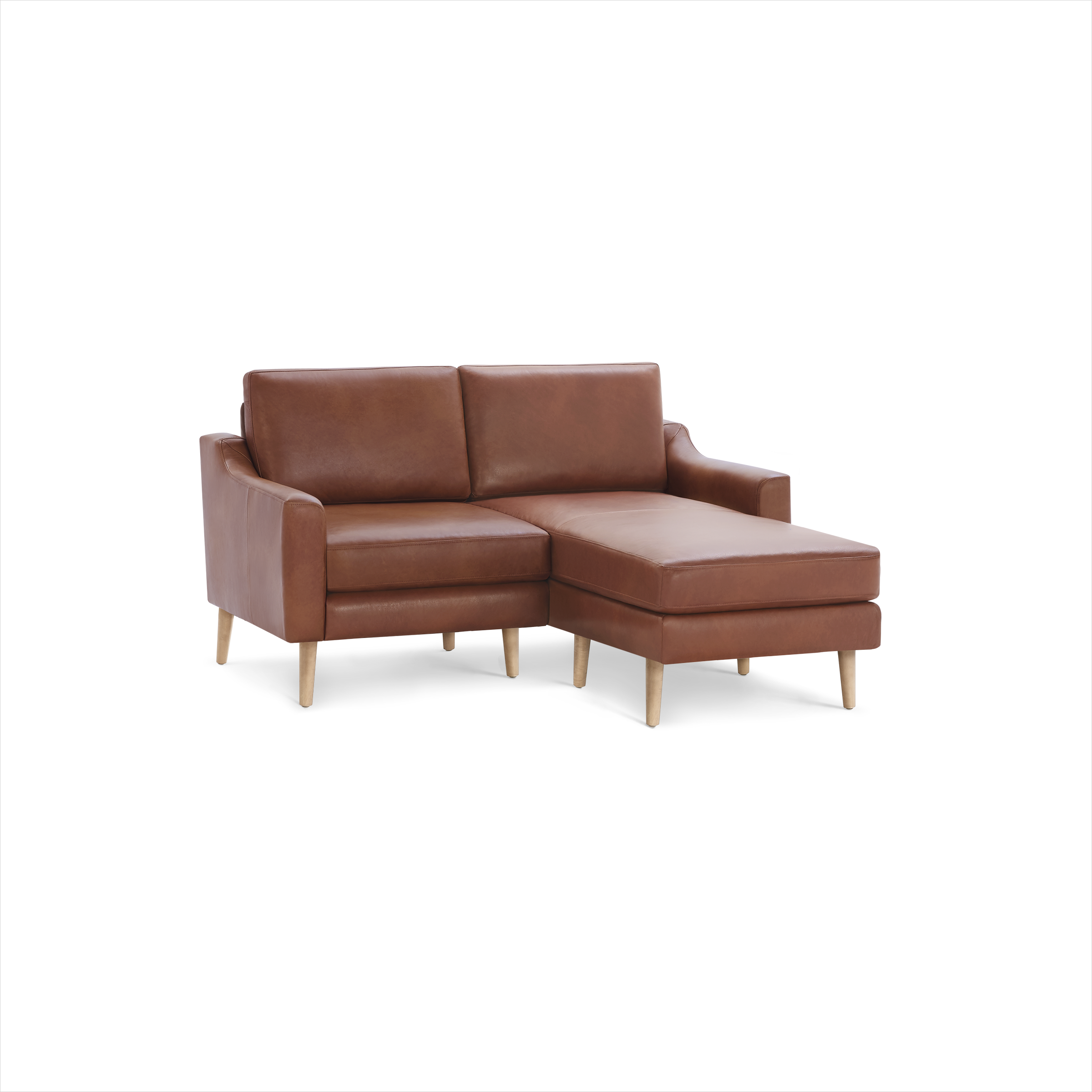 Modern brown leather sectional sofa with wooden legs, featuring a chaise lounge on the right side.