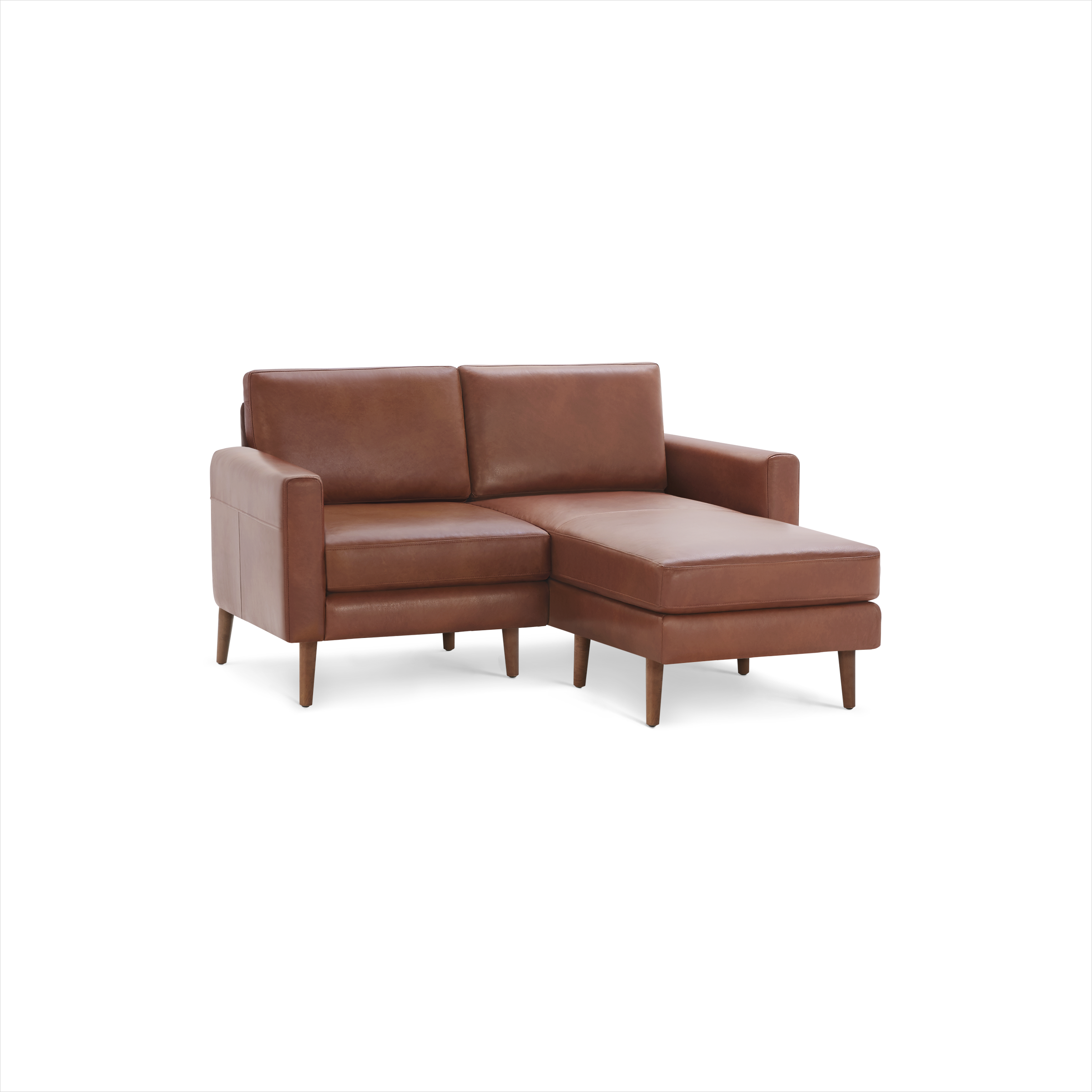 Mid-century modern style brown leather sectional sofa with wooden legs and a right chaise lounge.