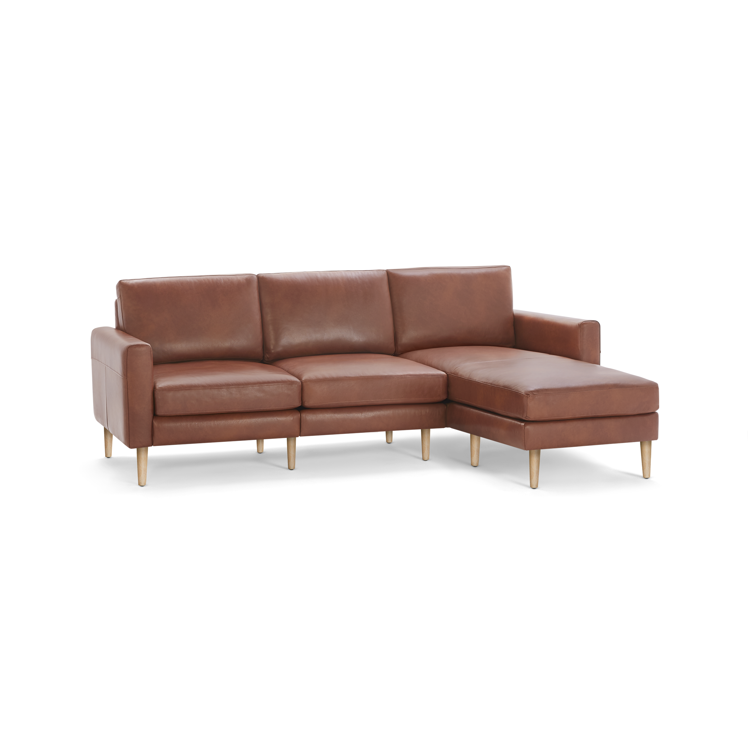 Modern brown leather sectional sofa with three seat cushions and wooden tapered legs, featuring a right-side chaise lounge.