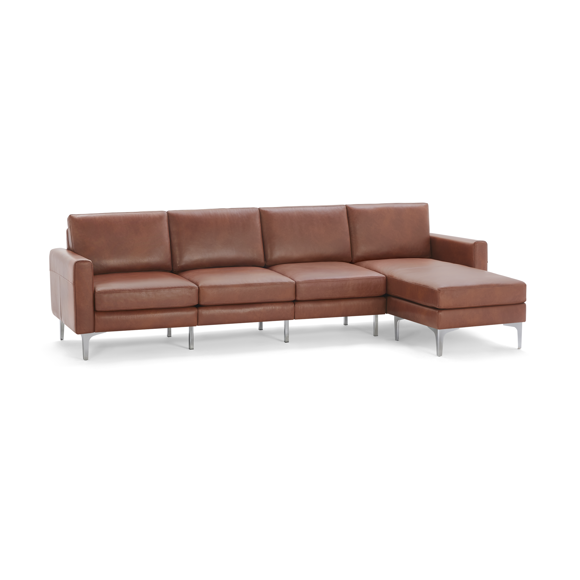 Modern sectional sofa with tan leather upholstery, metal legs, and chaise lounge on the right side.