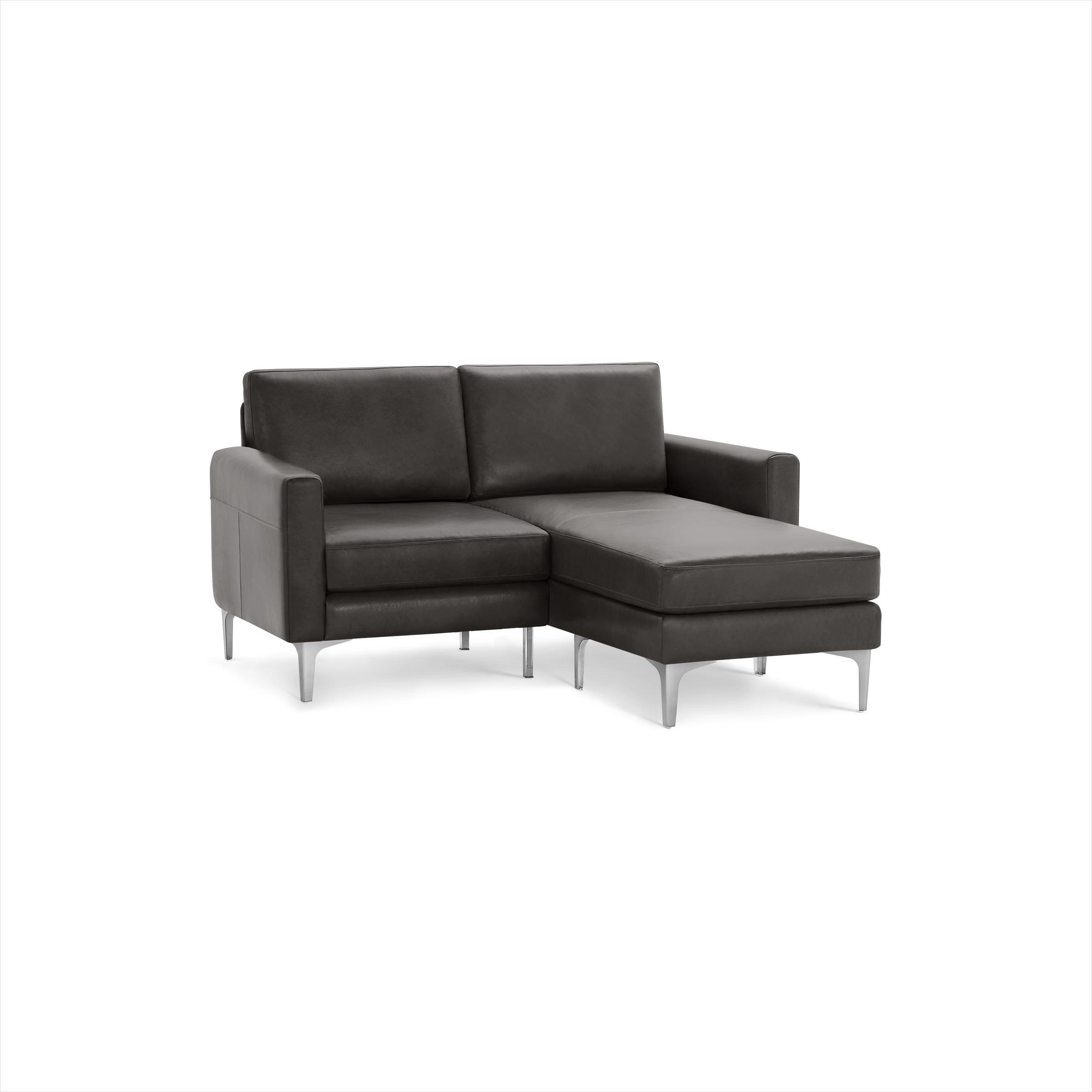 Modern dark gray leather sectional sofa with chaise lounge on right side and sleek metal legs.