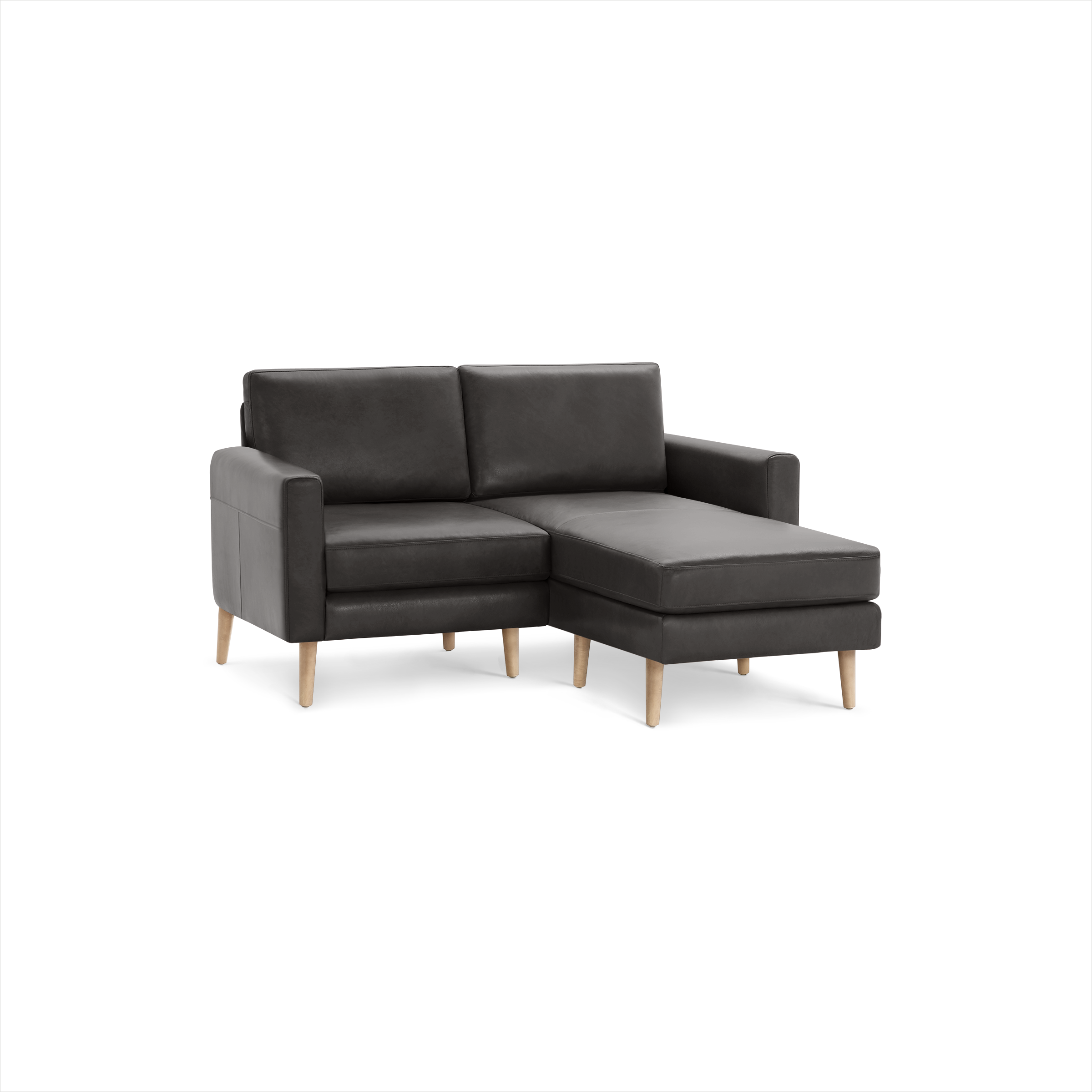 Dark gray modern sectional sofa with wooden legs, featuring a chaise lounge on the right side and cushioned backrests.