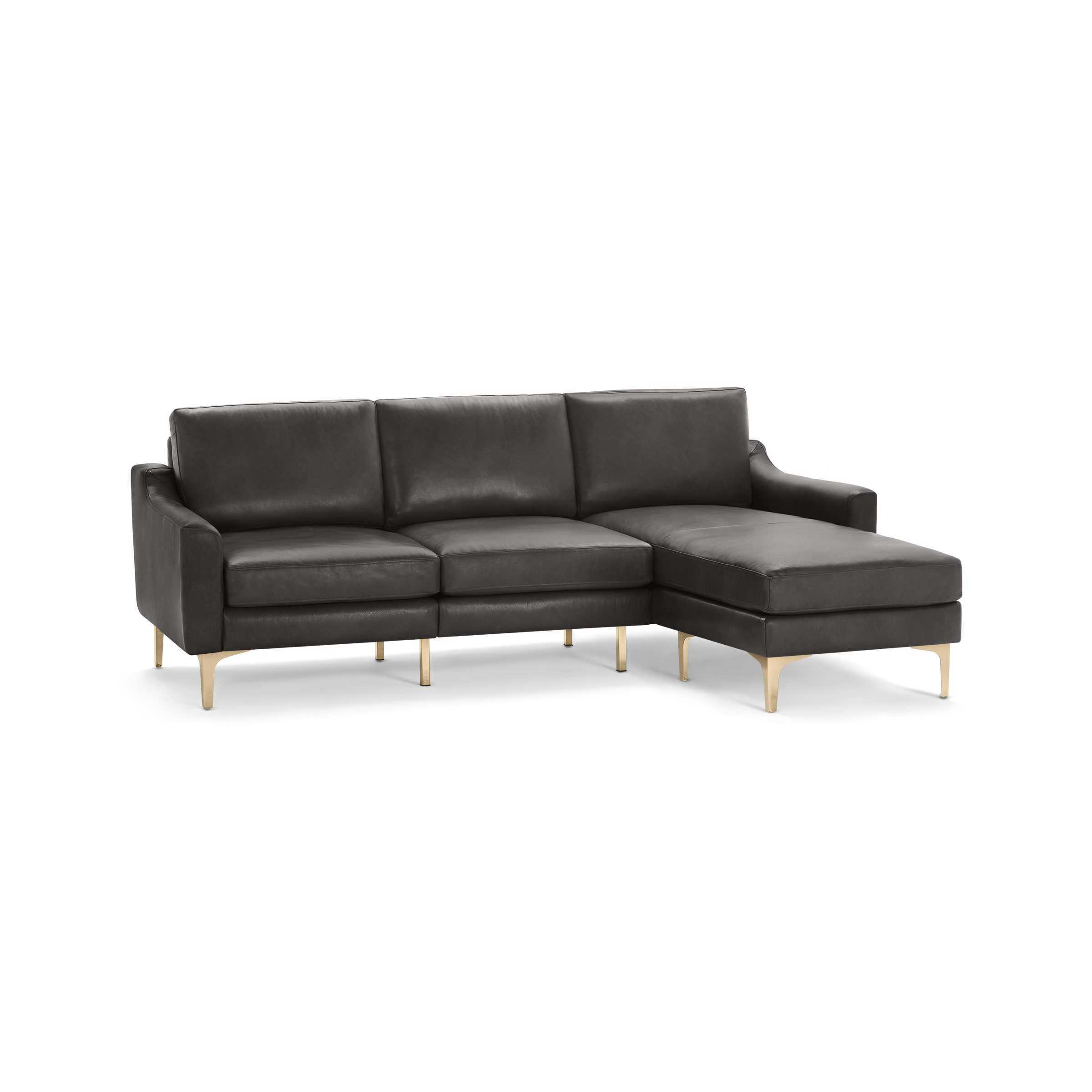Dark gray leather sectional sofa with chaise lounge on right side and slim gold-colored legs.