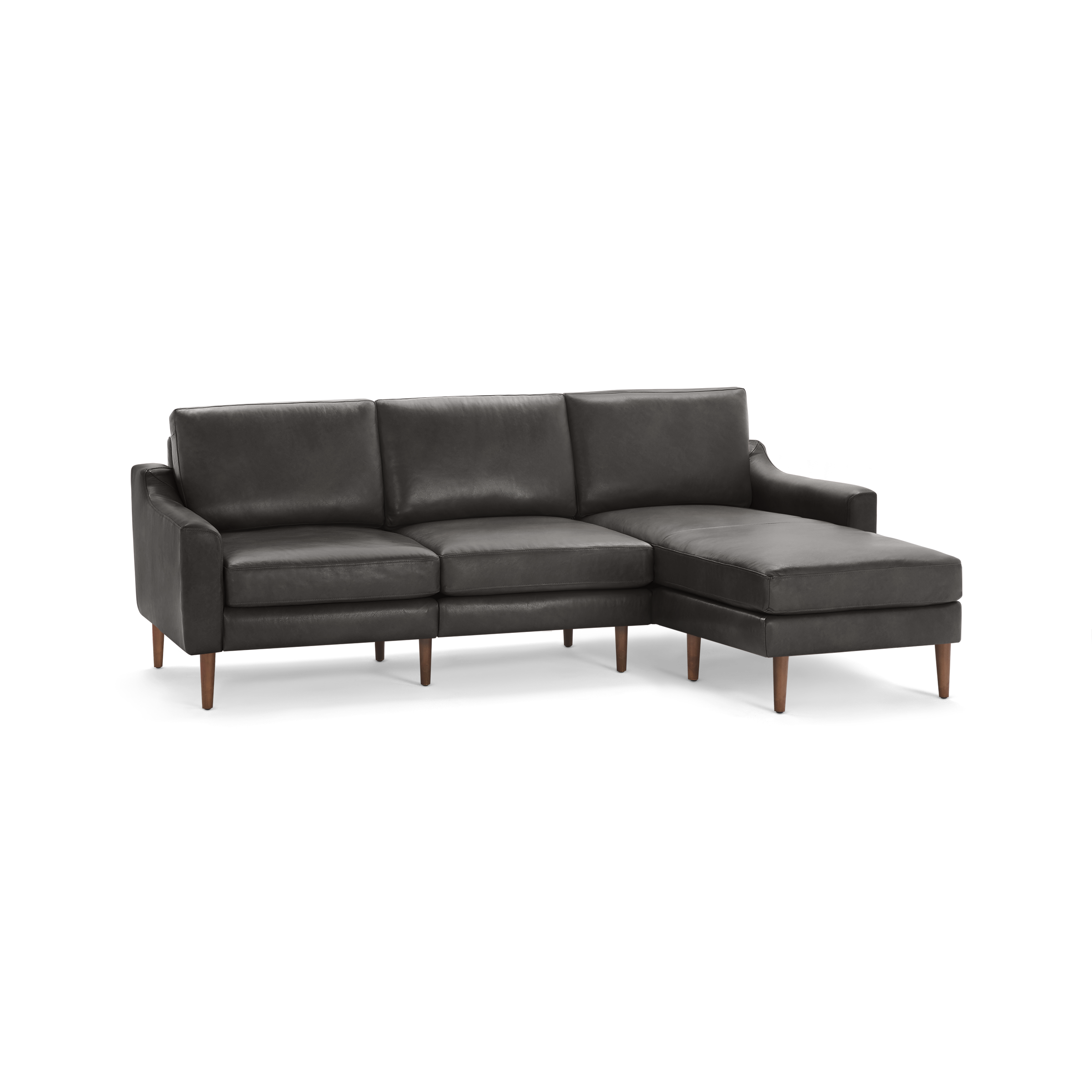Dark gray leather L-shaped sectional sofa with clean lines, three seat cushions, wooden legs, and a chaise lounge on the right side.