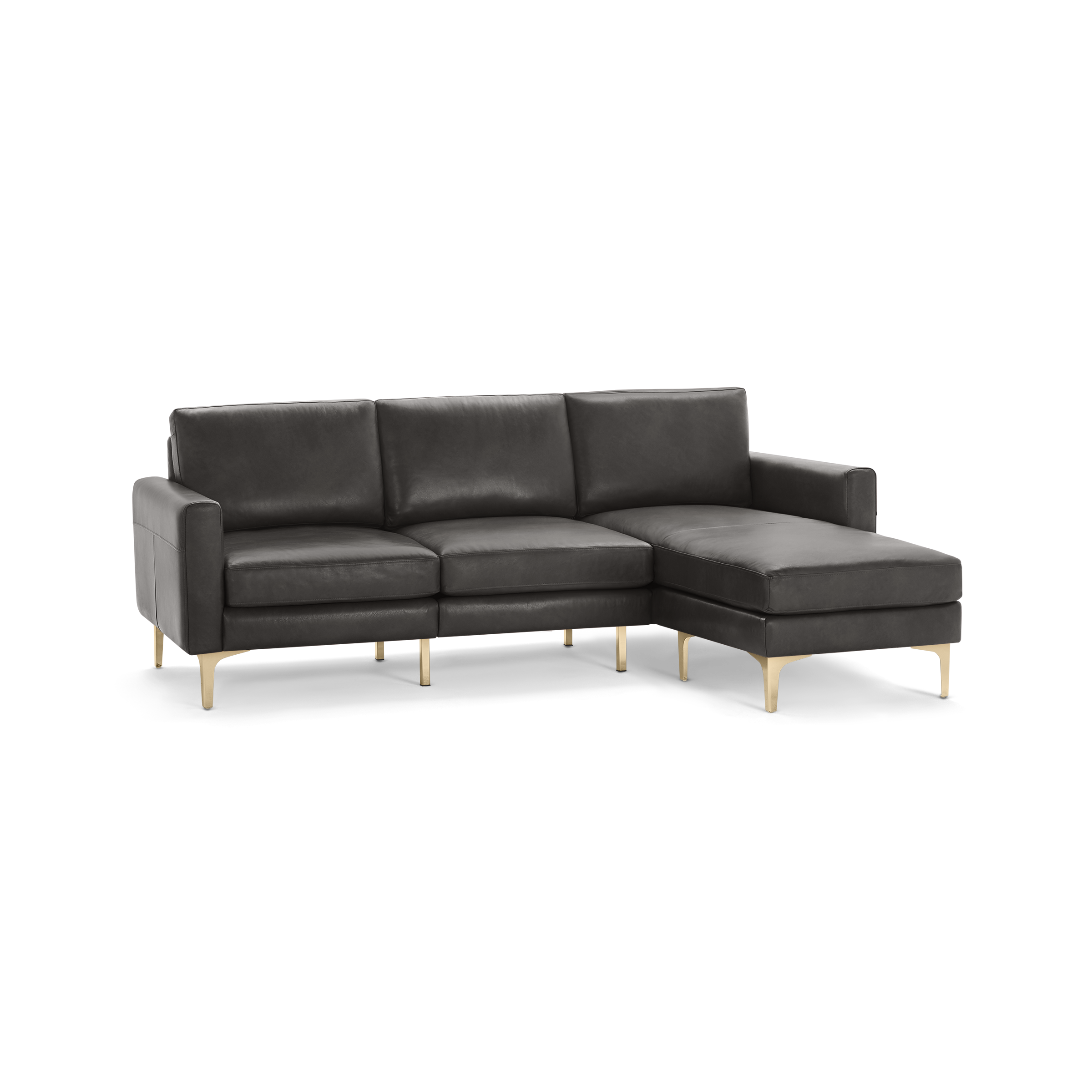 Modern dark gray leather sectional sofa with chaise lounge and gold metal legs, featuring clean lines and plush cushions.