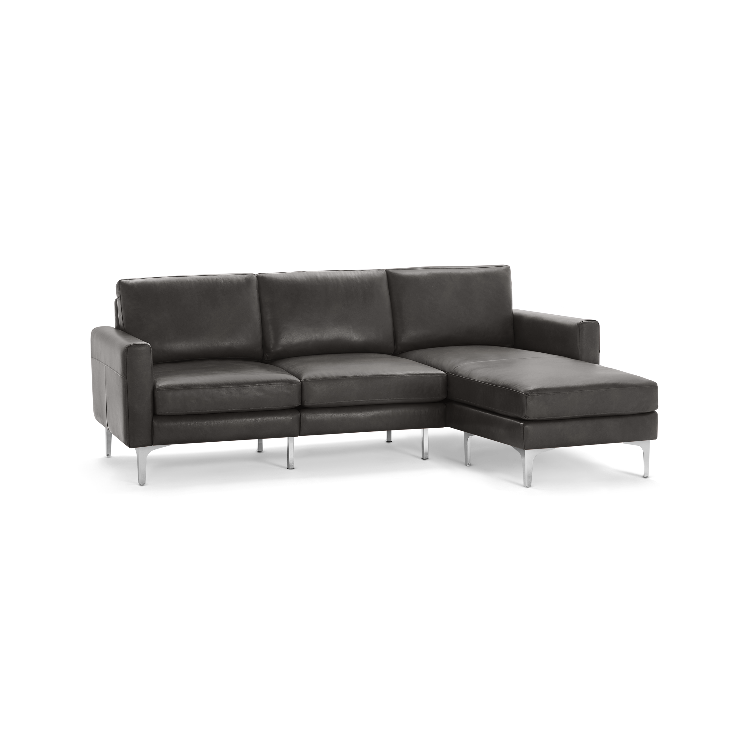 Modern dark gray leather sectional sofa with chaise lounge, cushioned seats, and slim metal legs, ideal for contemporary living spaces.
