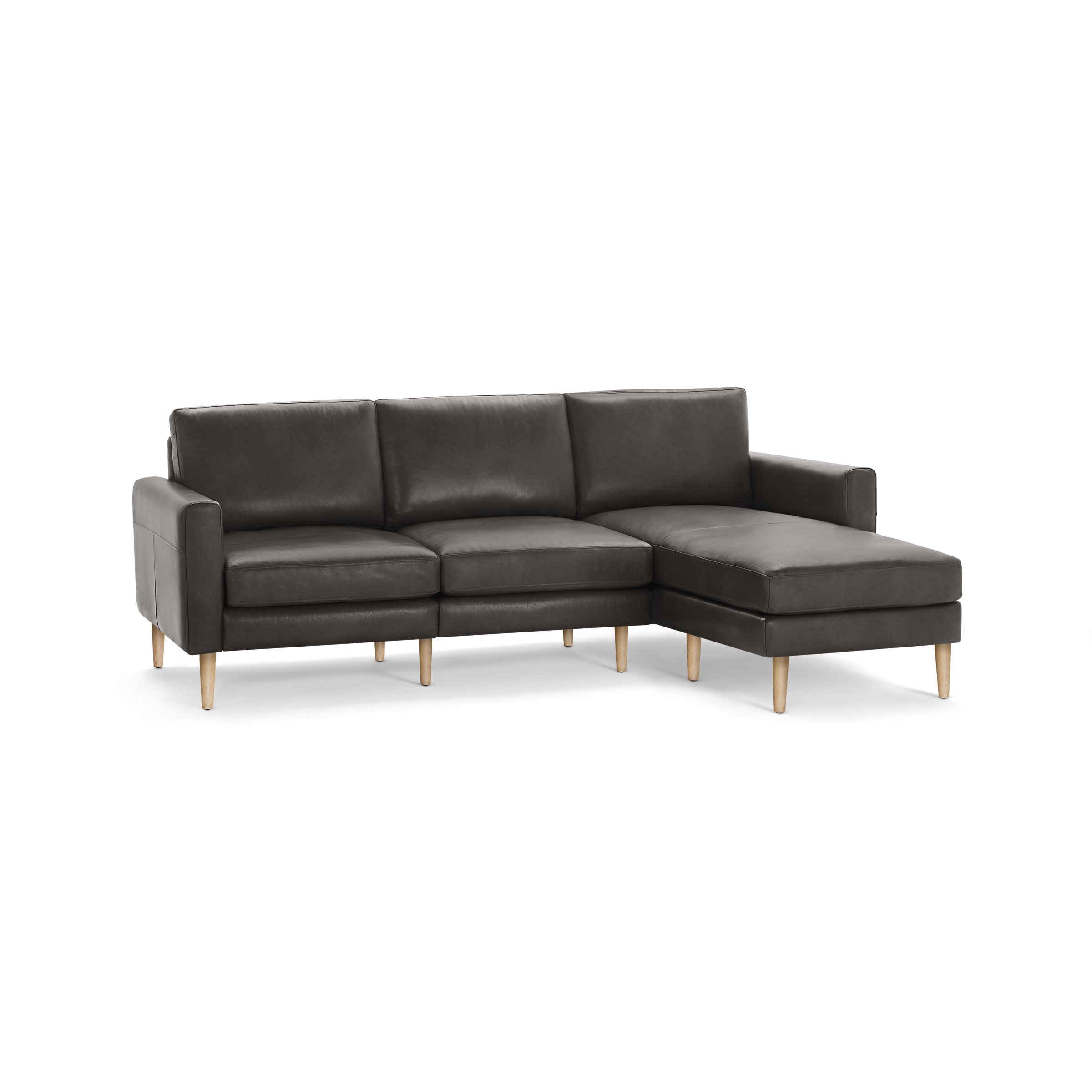 Modern dark gray L-shaped sectional sofa with wooden legs and three cushioned seats and backrests.