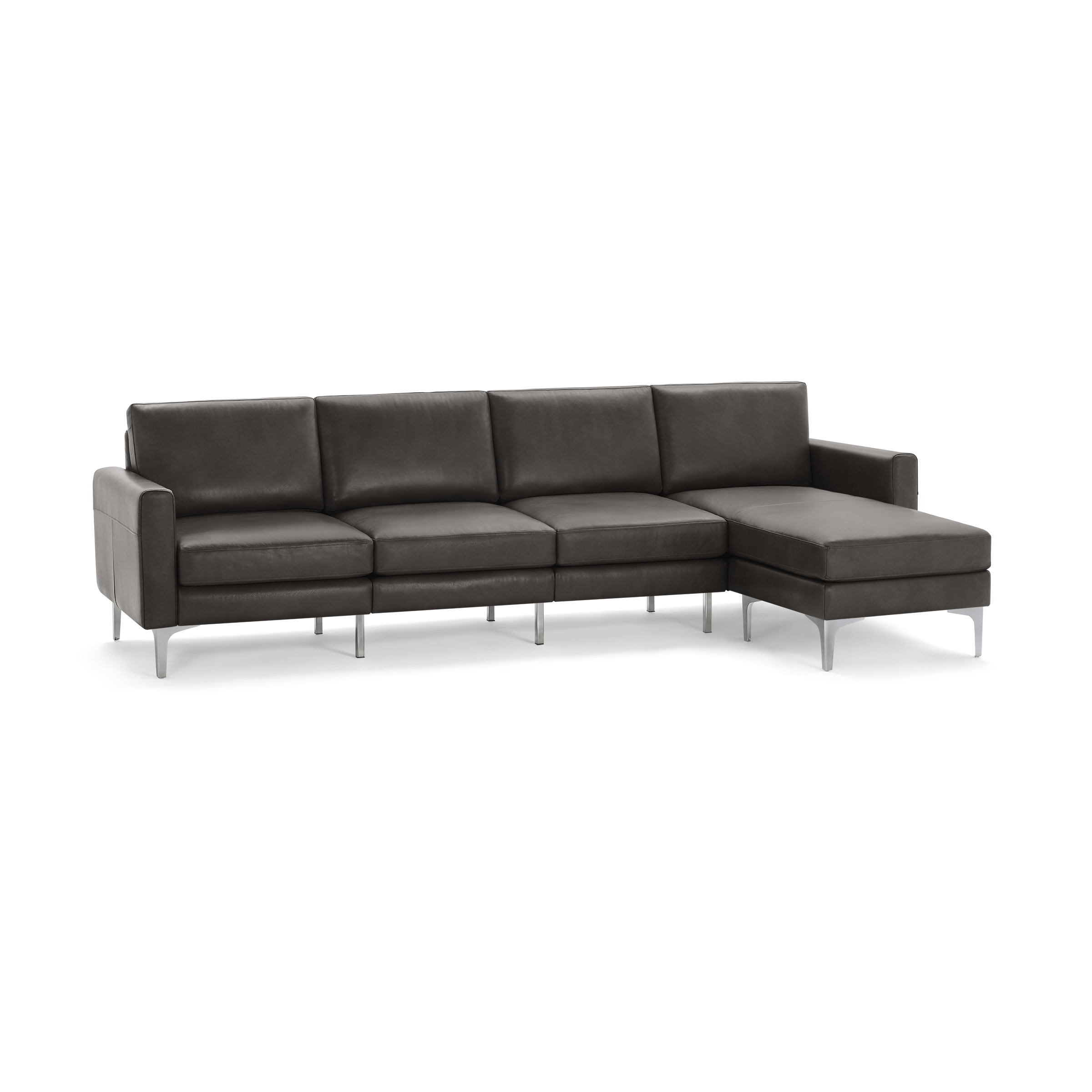 Modern dark gray leather sectional sofa with four seats and metal legs, featuring a right-side chaise lounge.