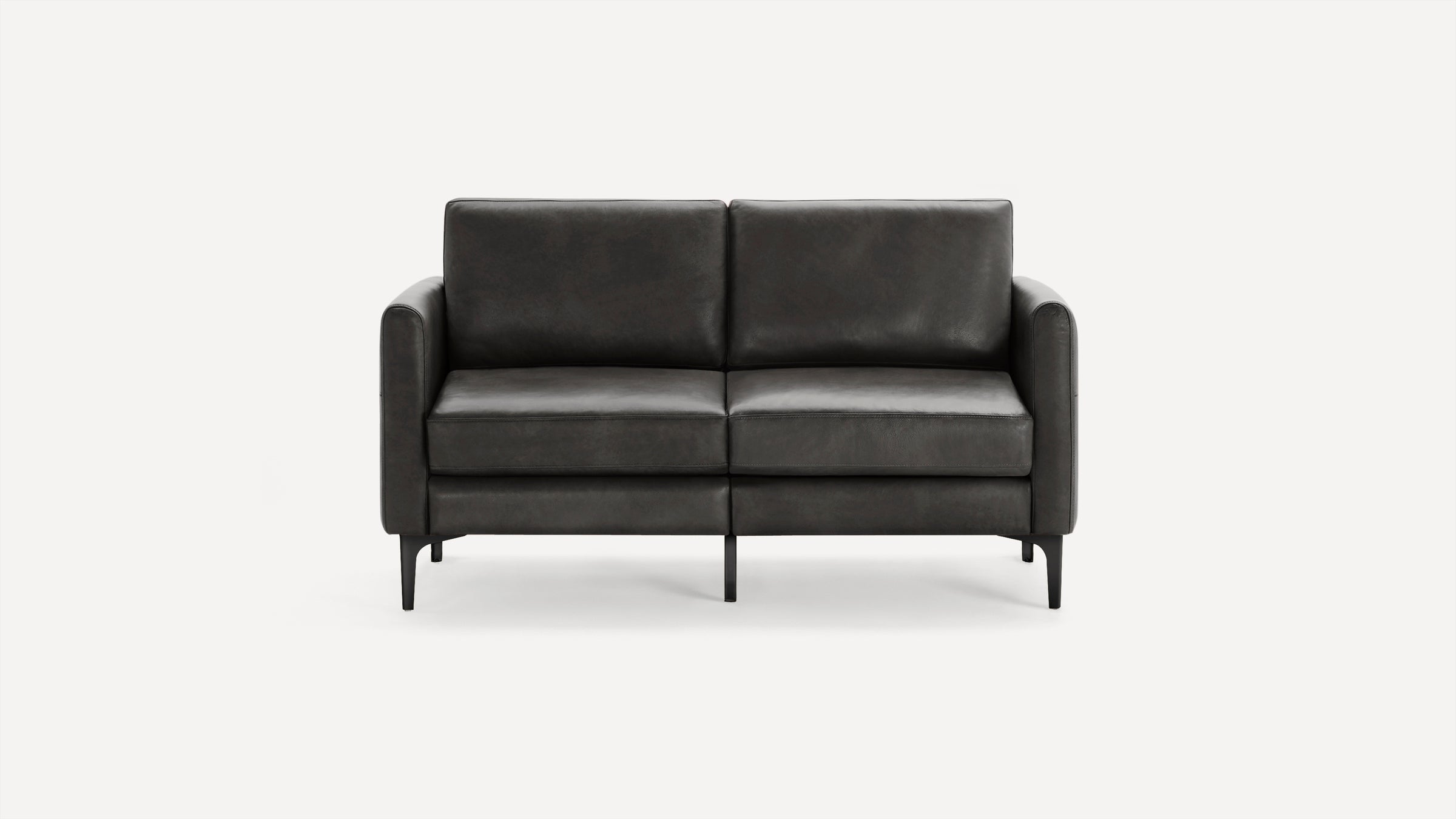 Modern two-seater sofa upholstered in dark gray leather with clean lines, straight arms, and black tapered legs.